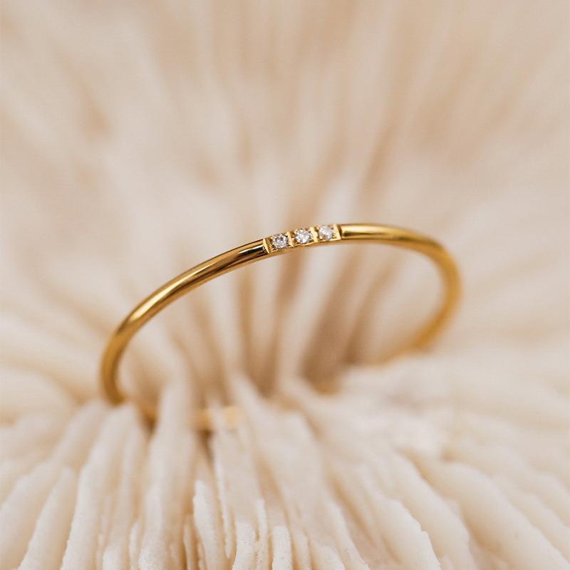 three stone gold ring