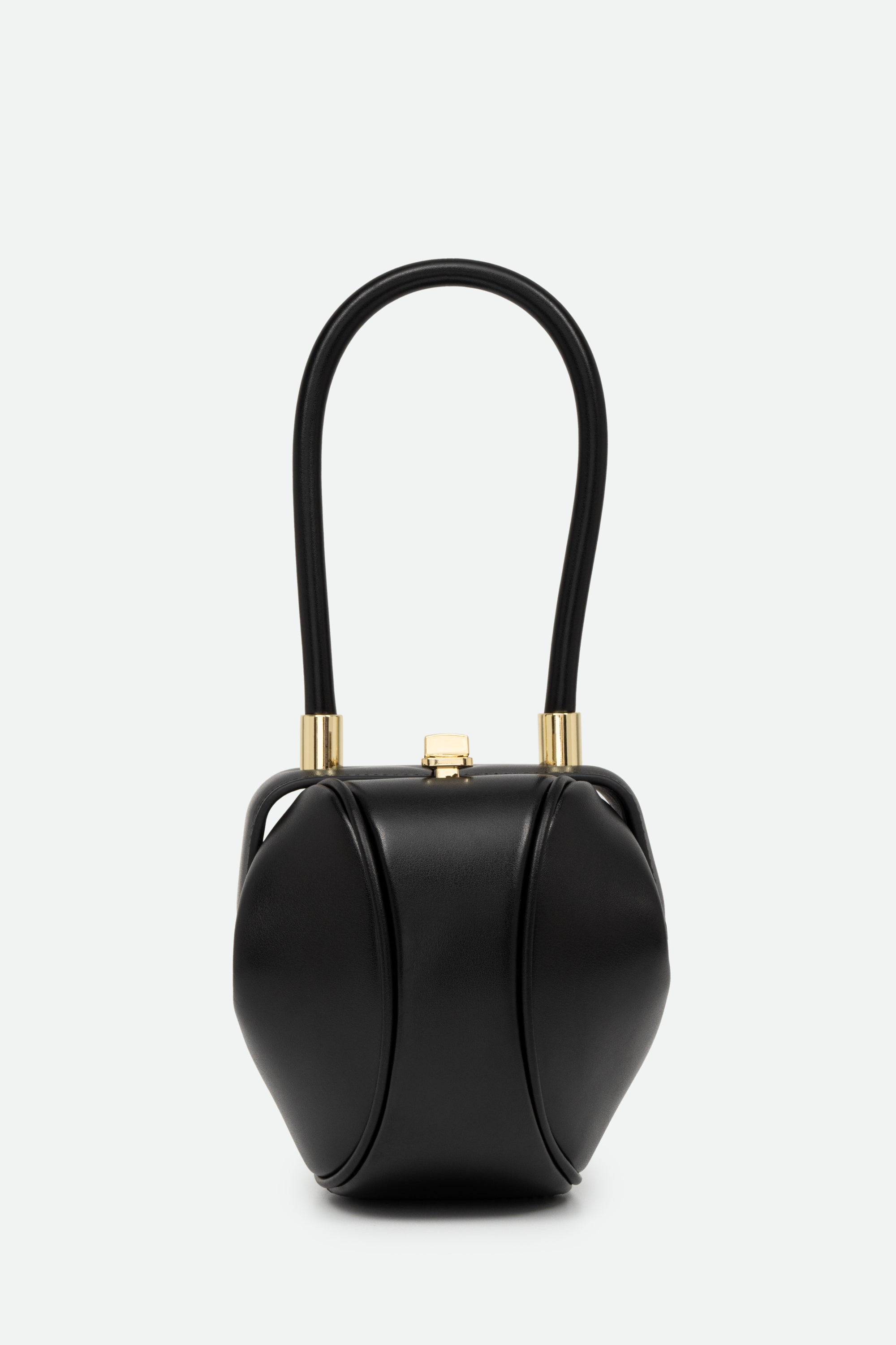 Black handbag with gold accents on a white background