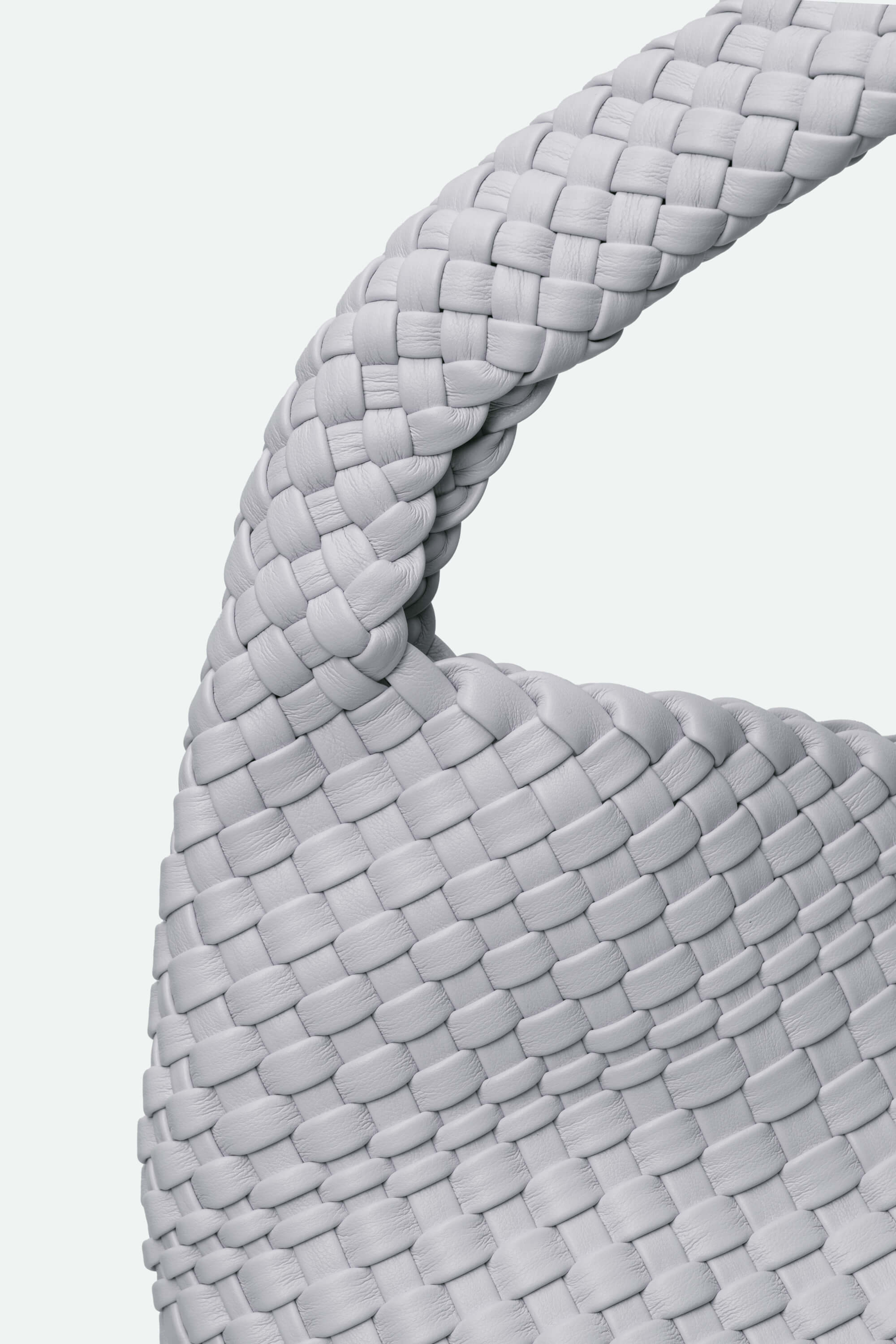 Close-up of a woven gray fabric with a white background