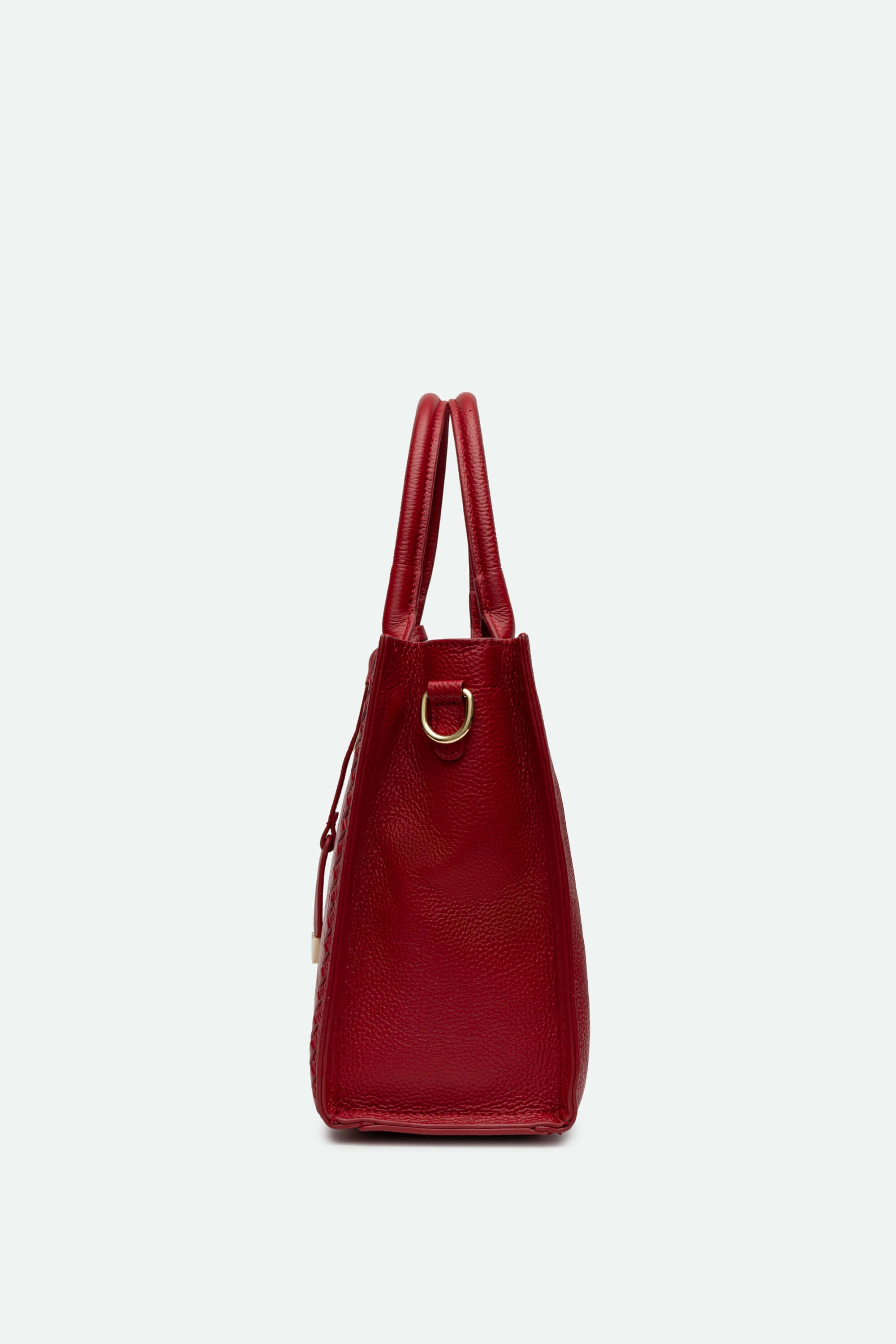 Red handbag on a light gray background