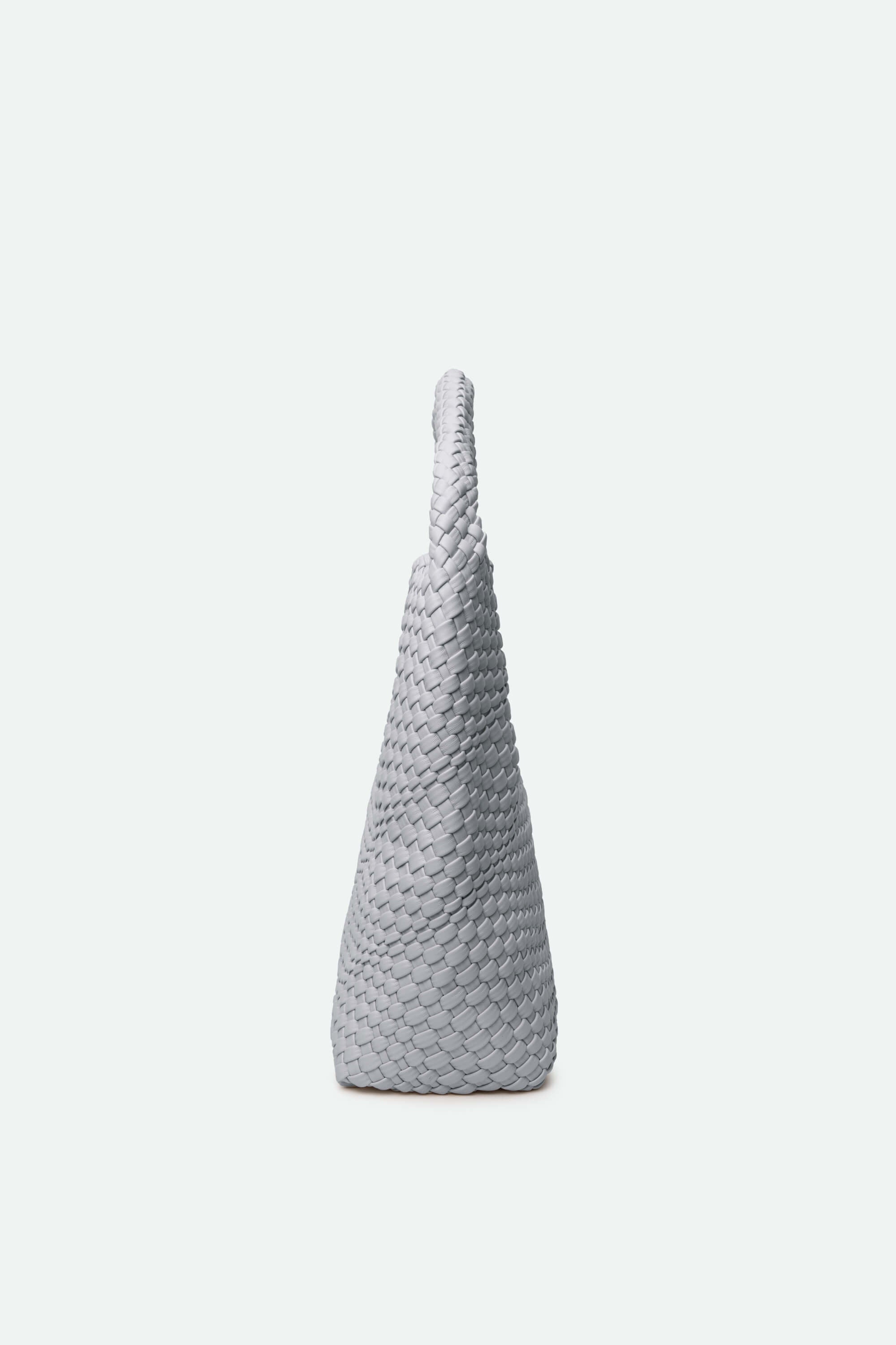 Gray textured vase on a white background