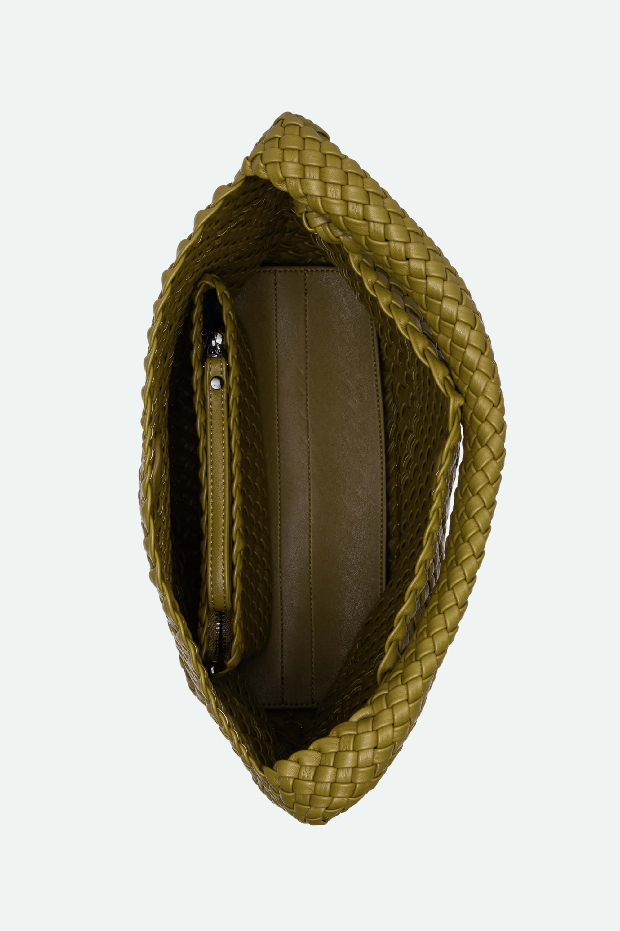 Green woven handbag on a white background