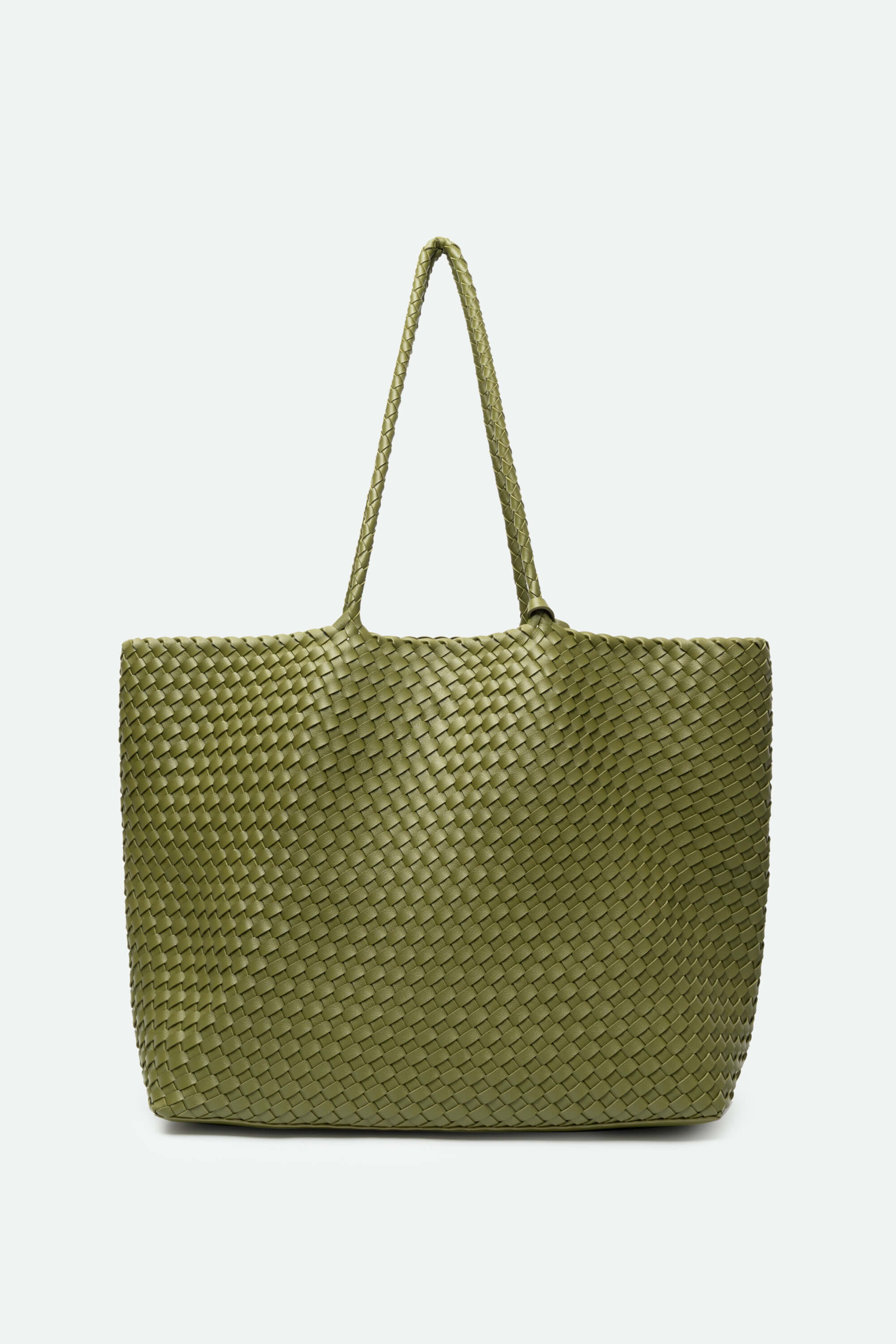 Green woven tote bag on a white background
