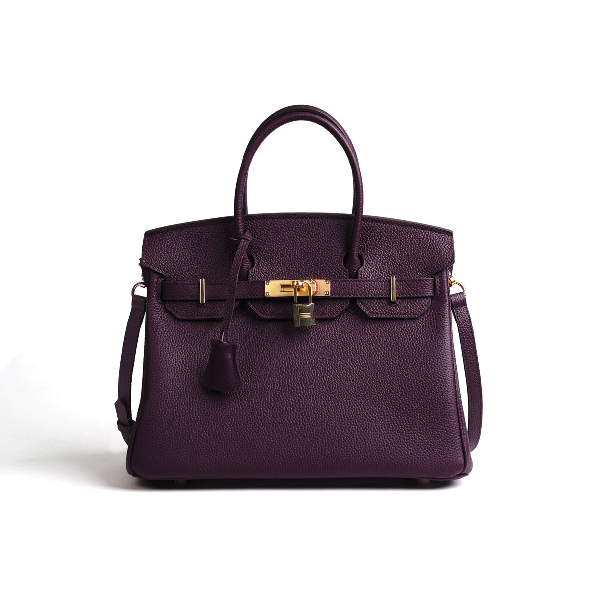 Purple handbag with gold hardware on a white background