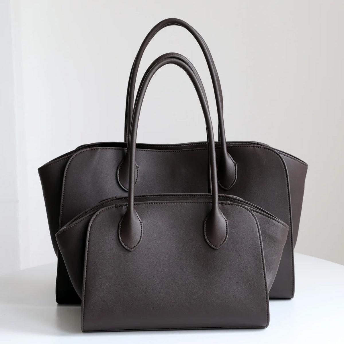 Valentina Volta Small shoulder bag in Coffee, worn