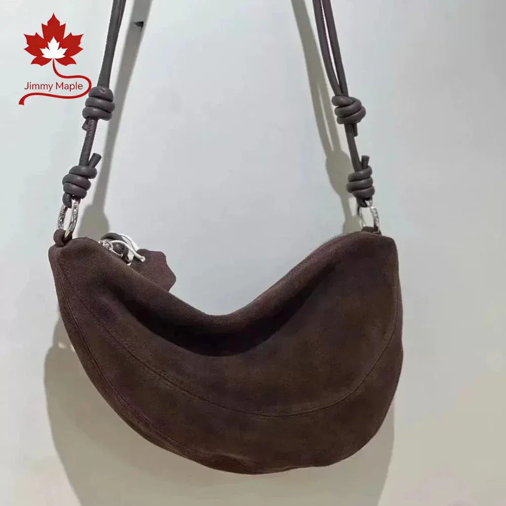 Valentina Bruma crescent bag in Wine red, side view