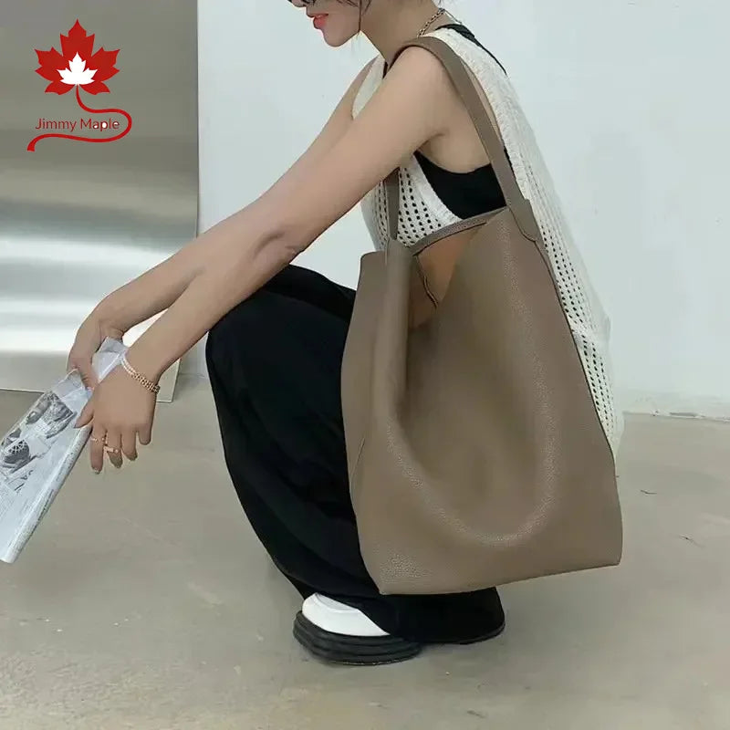 Valentina Tela Small bucket bag in Grey, worn