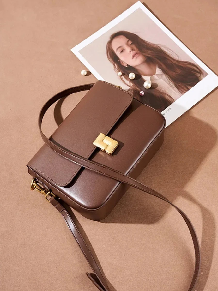 Valentina Monte crossbody bag in Coffee, worn