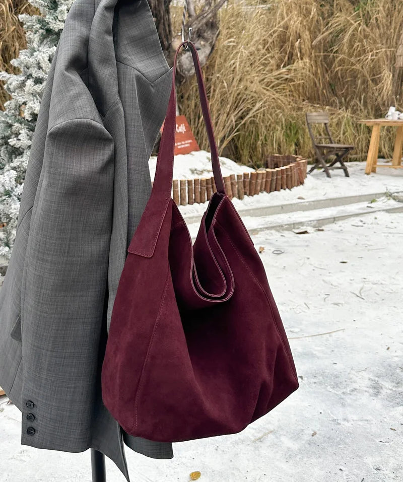 Valentina Fiato bucket bag in Wine red