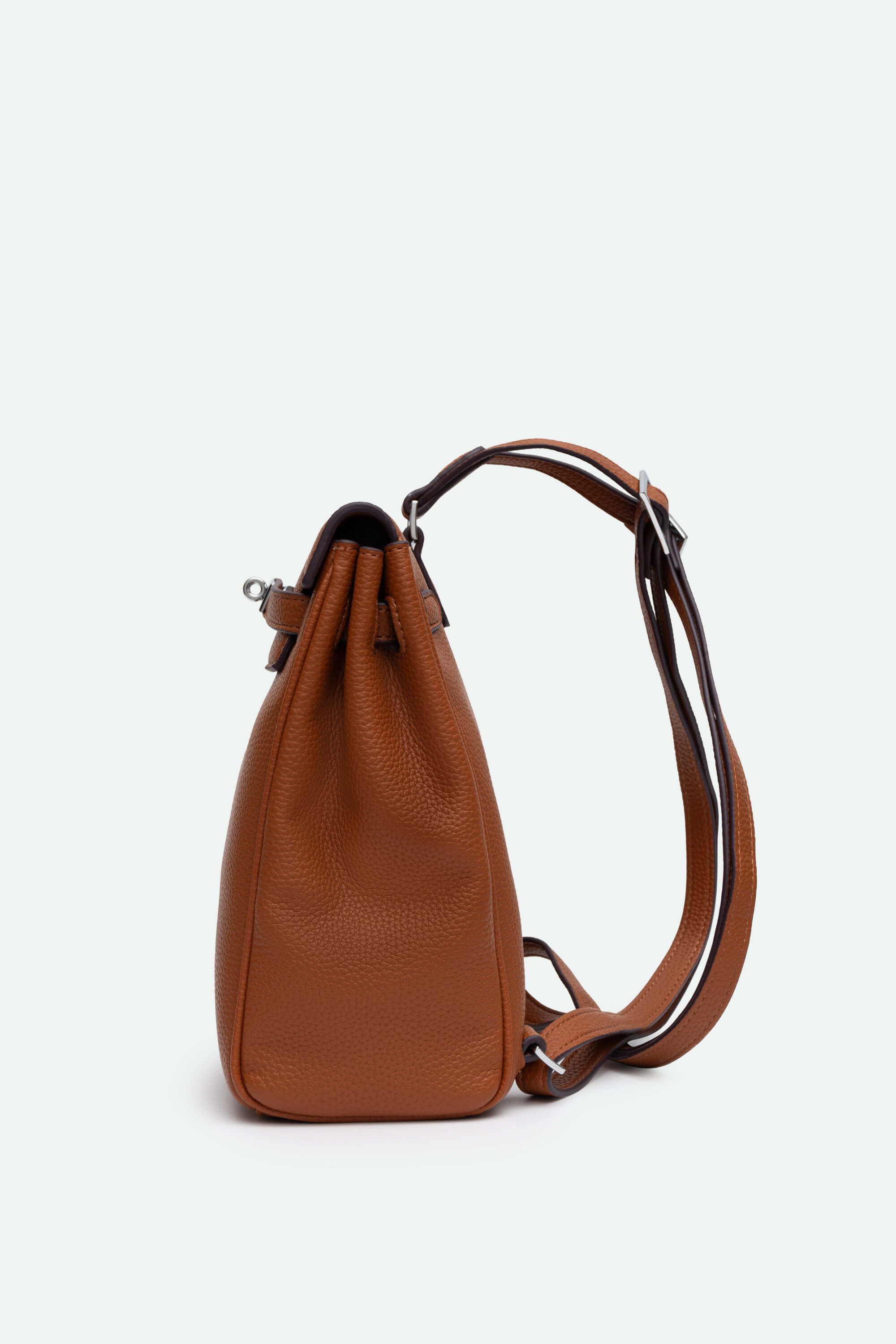 Brown leather backpack on a white background