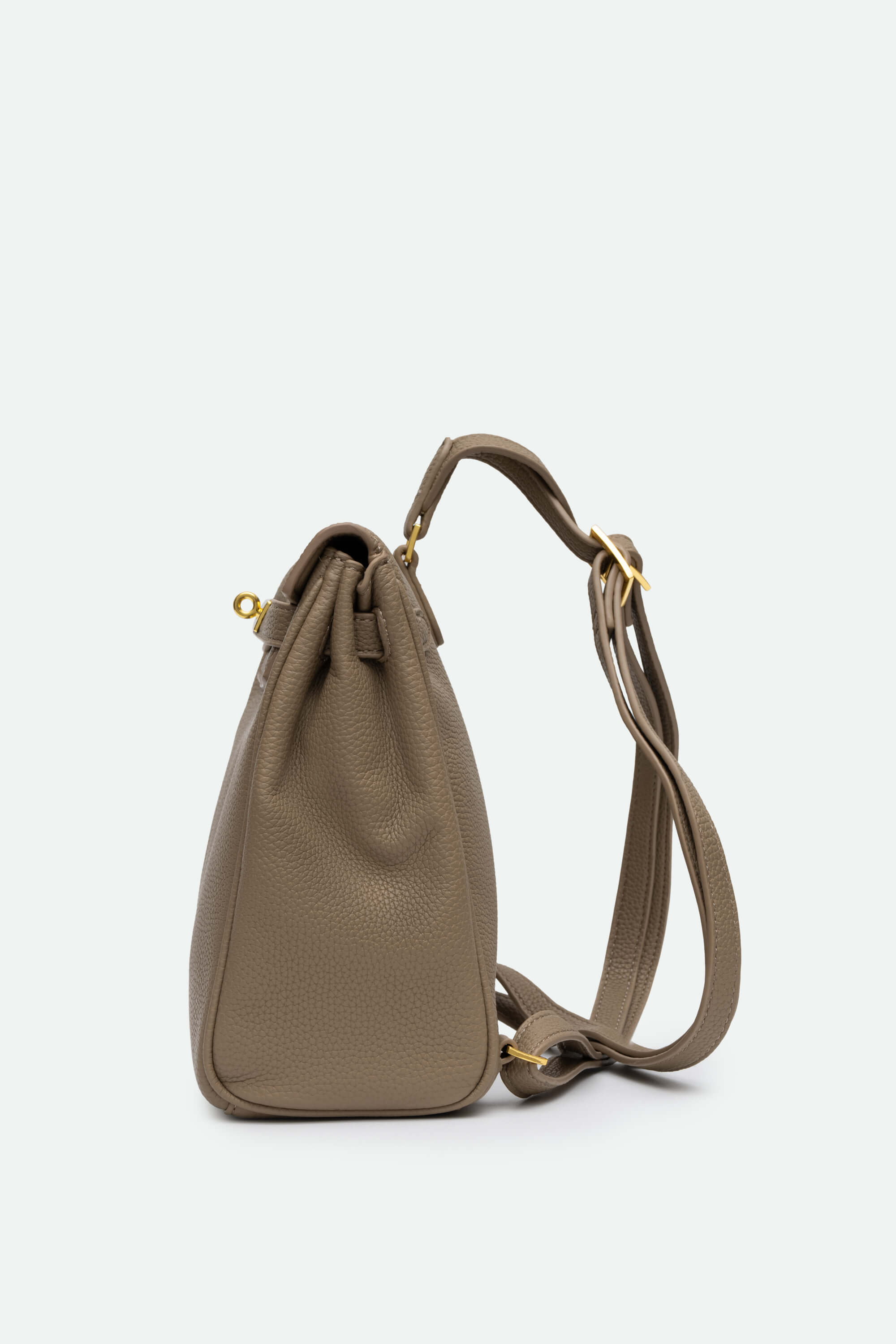 Brown leather bucket bag with a strap on a white background