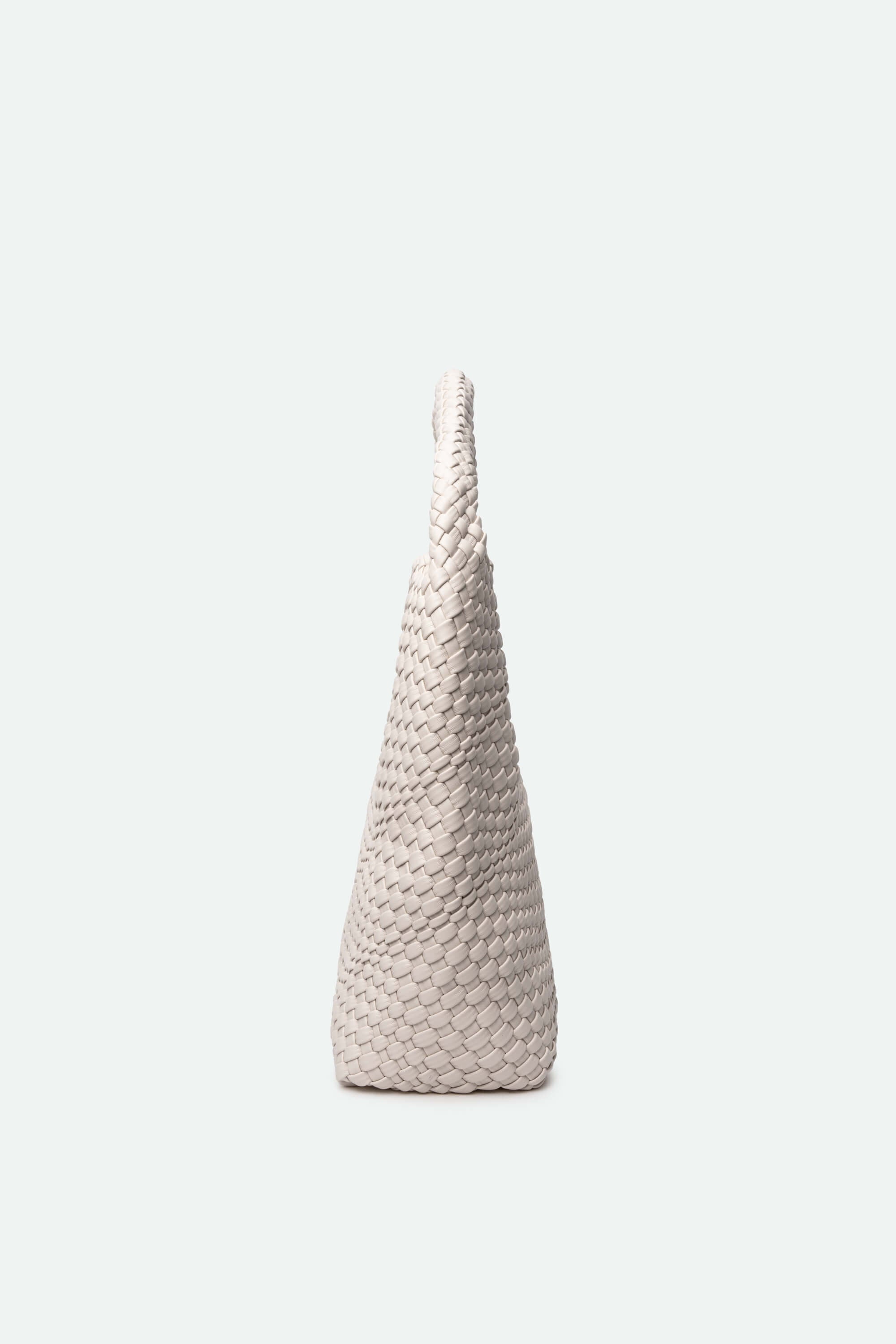 Textured cone-shaped vase on a white background