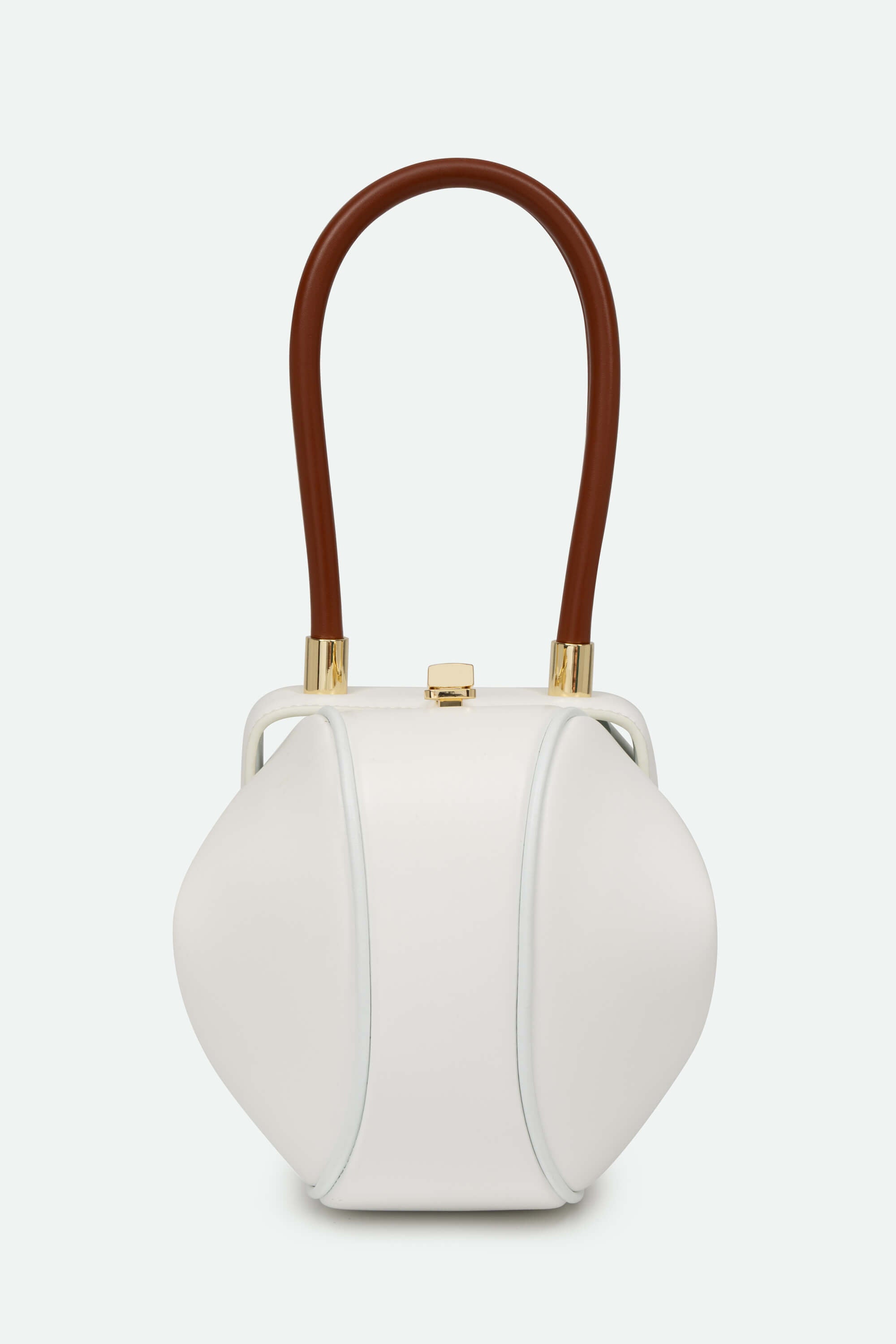 White handbag with brown handle on a white background