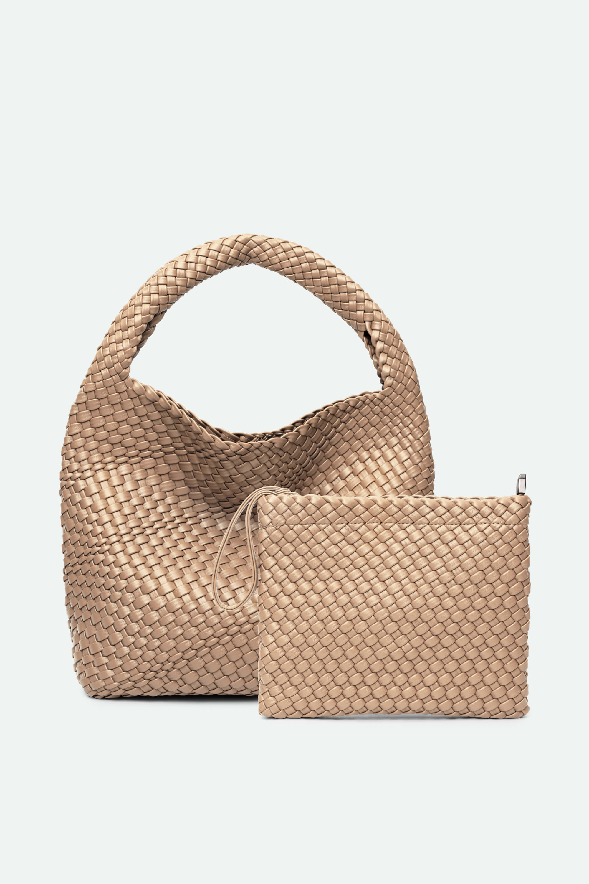 Woven beige handbag and matching pouch on a light gray background