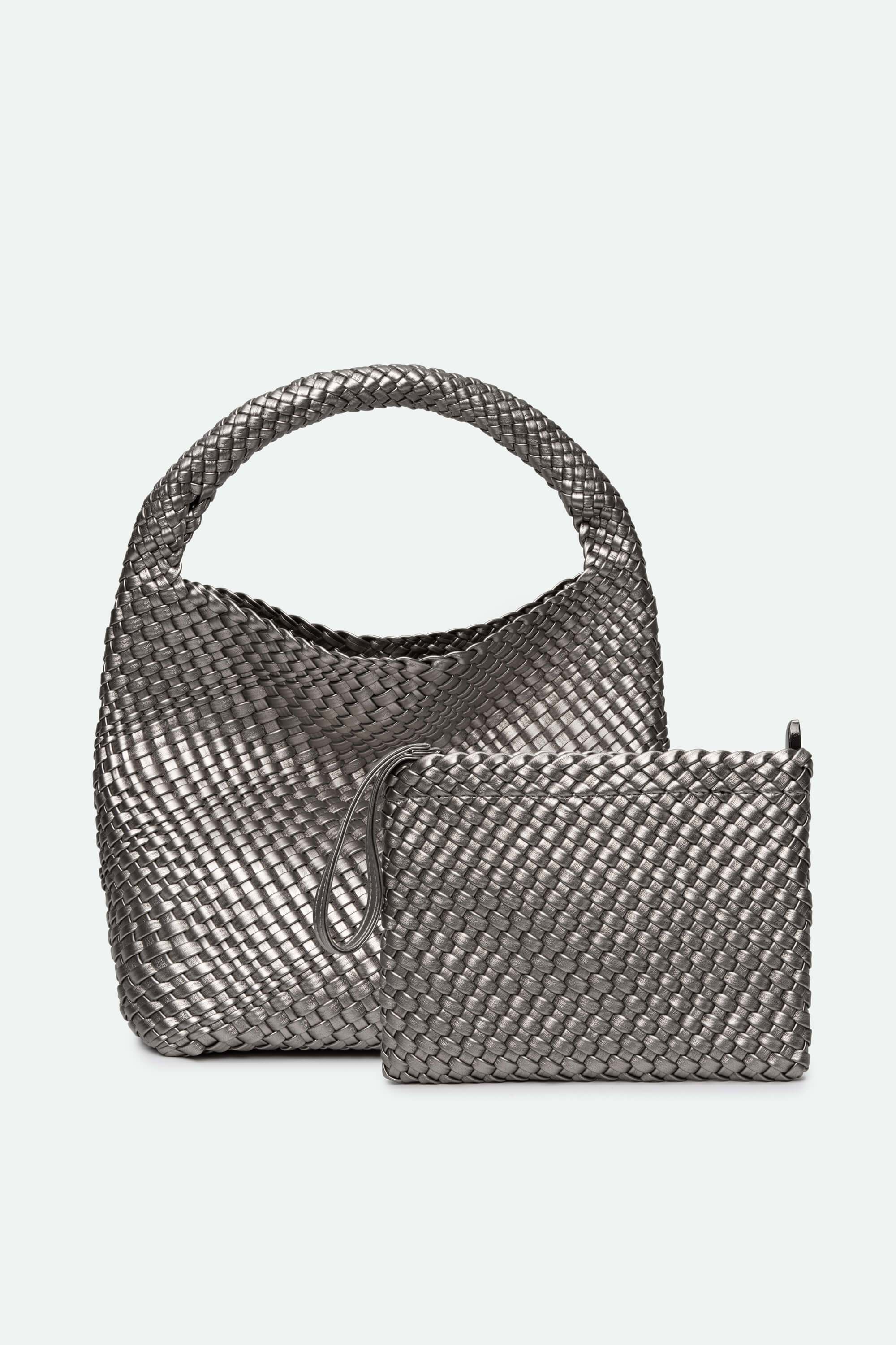 Woven handbag and matching pouch on a light gray background