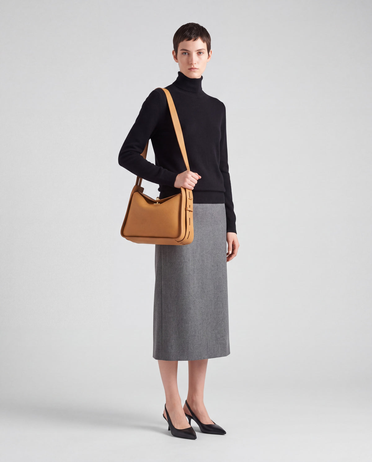 Asti bag in Camel – worn by model, full length