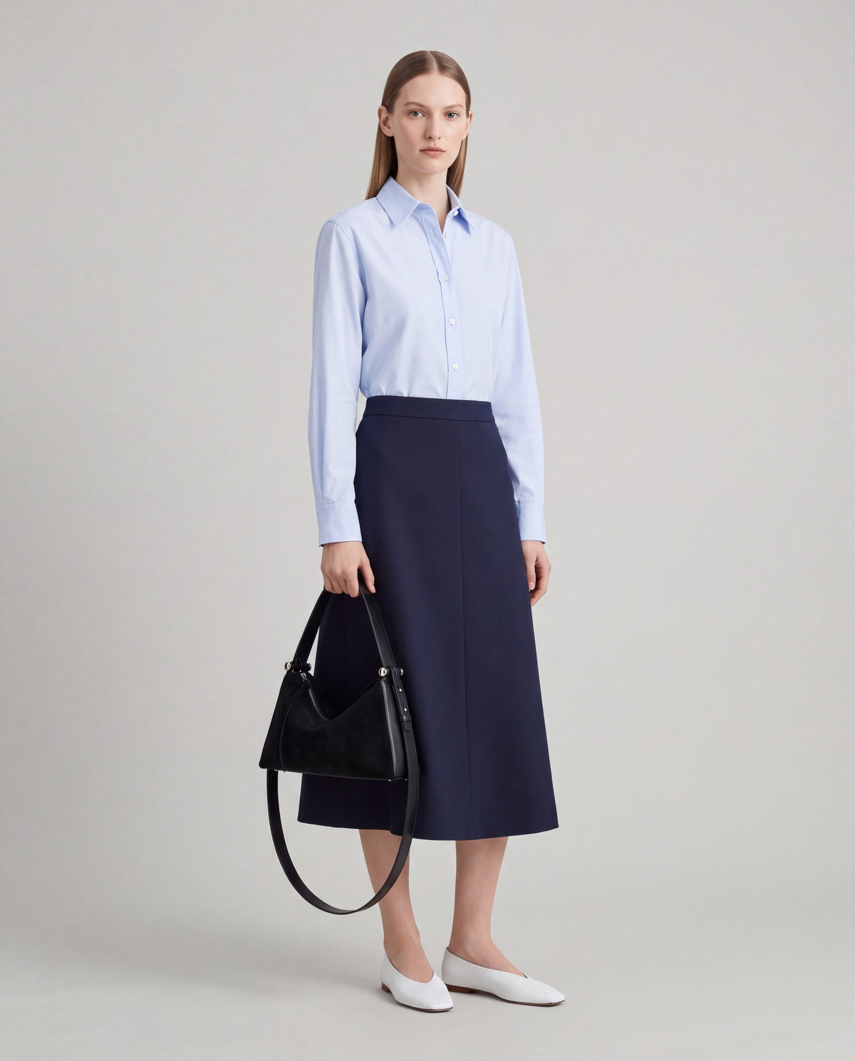Asti bag in Onyx – worn by model, full length
