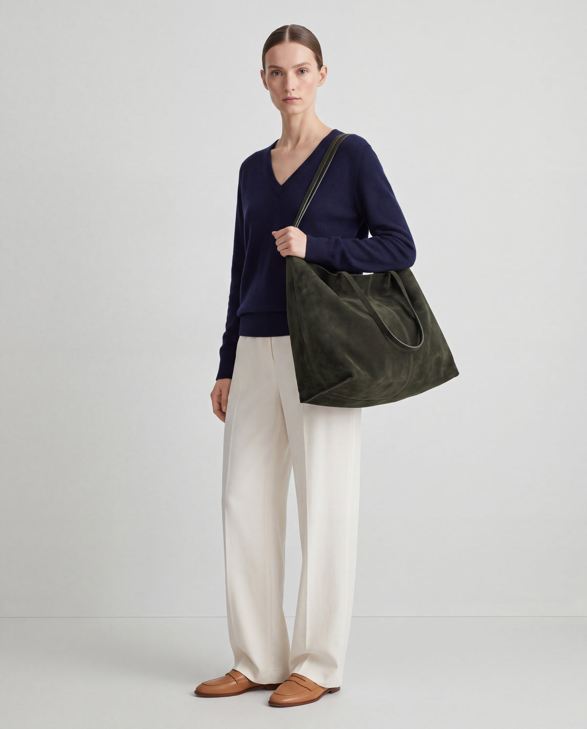 Bello bag in Green – worn by model, full length