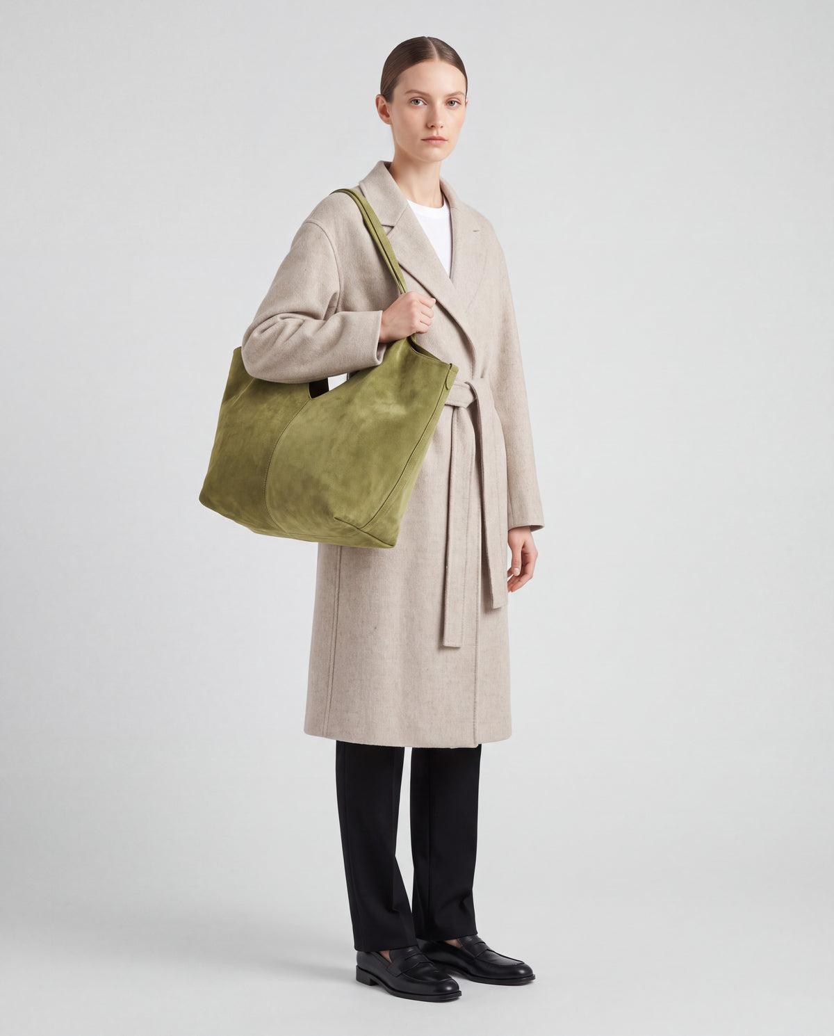 Bello bag in Pistachio – worn by model, full length