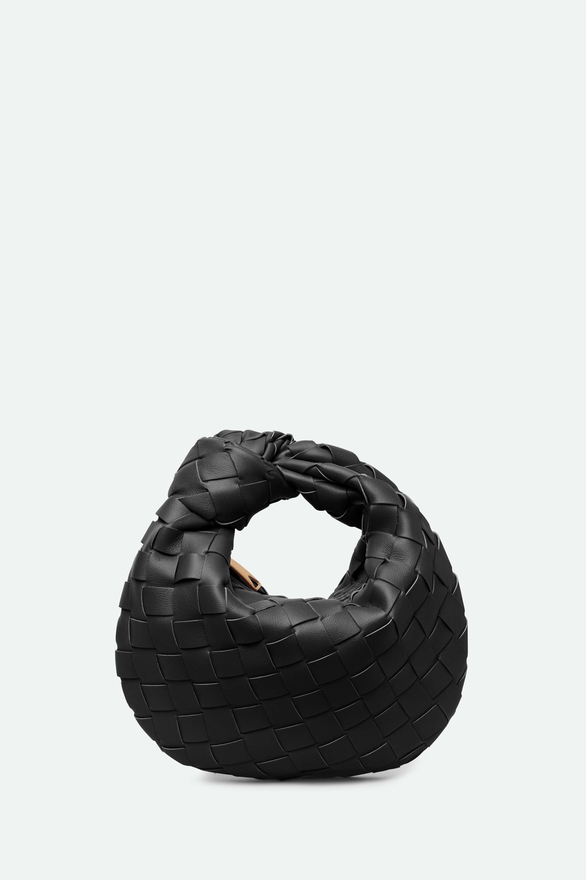 Black woven mini knot handbag with knotted handle on white background