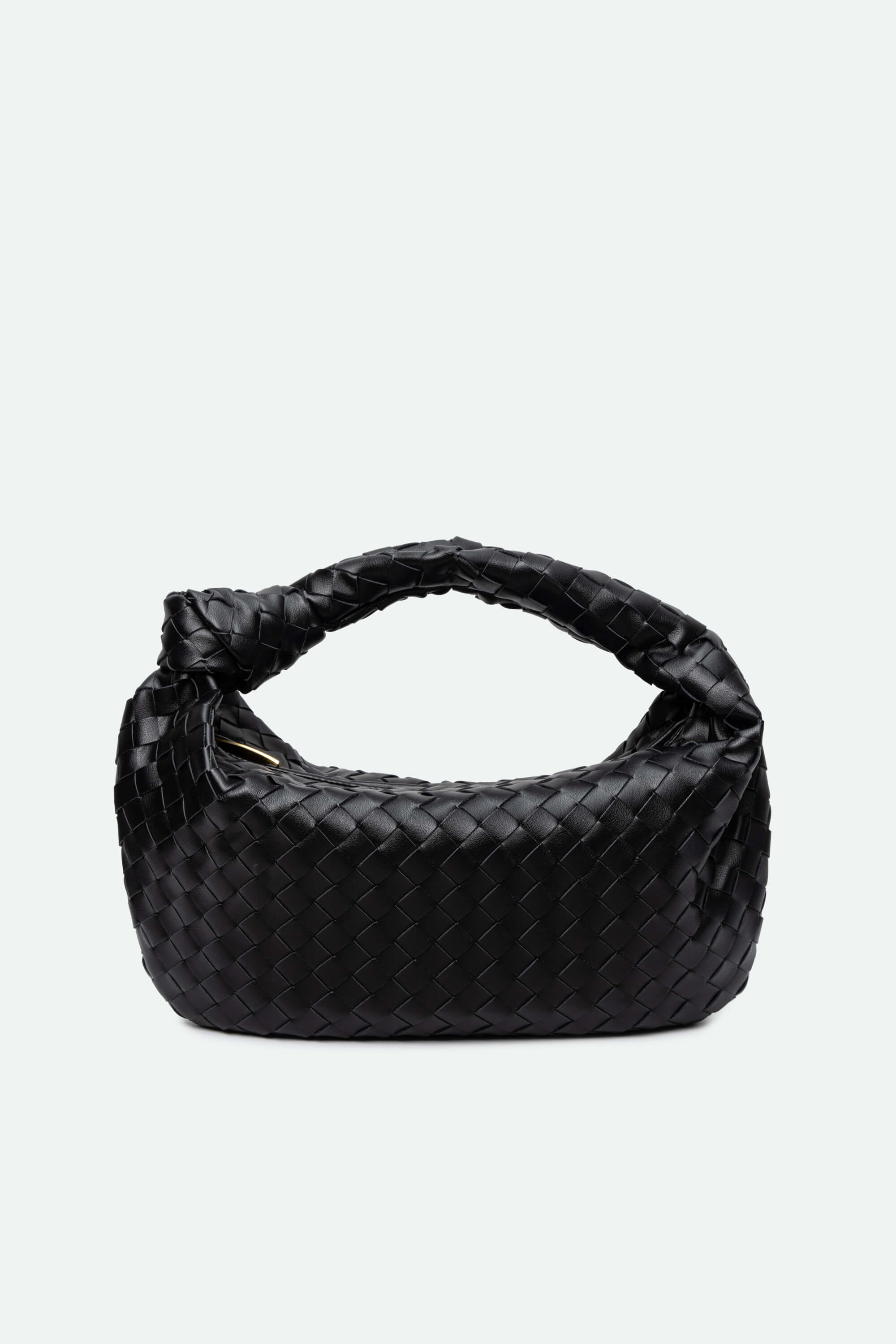 Black woven knot bag with a knotted handle on a light gray background