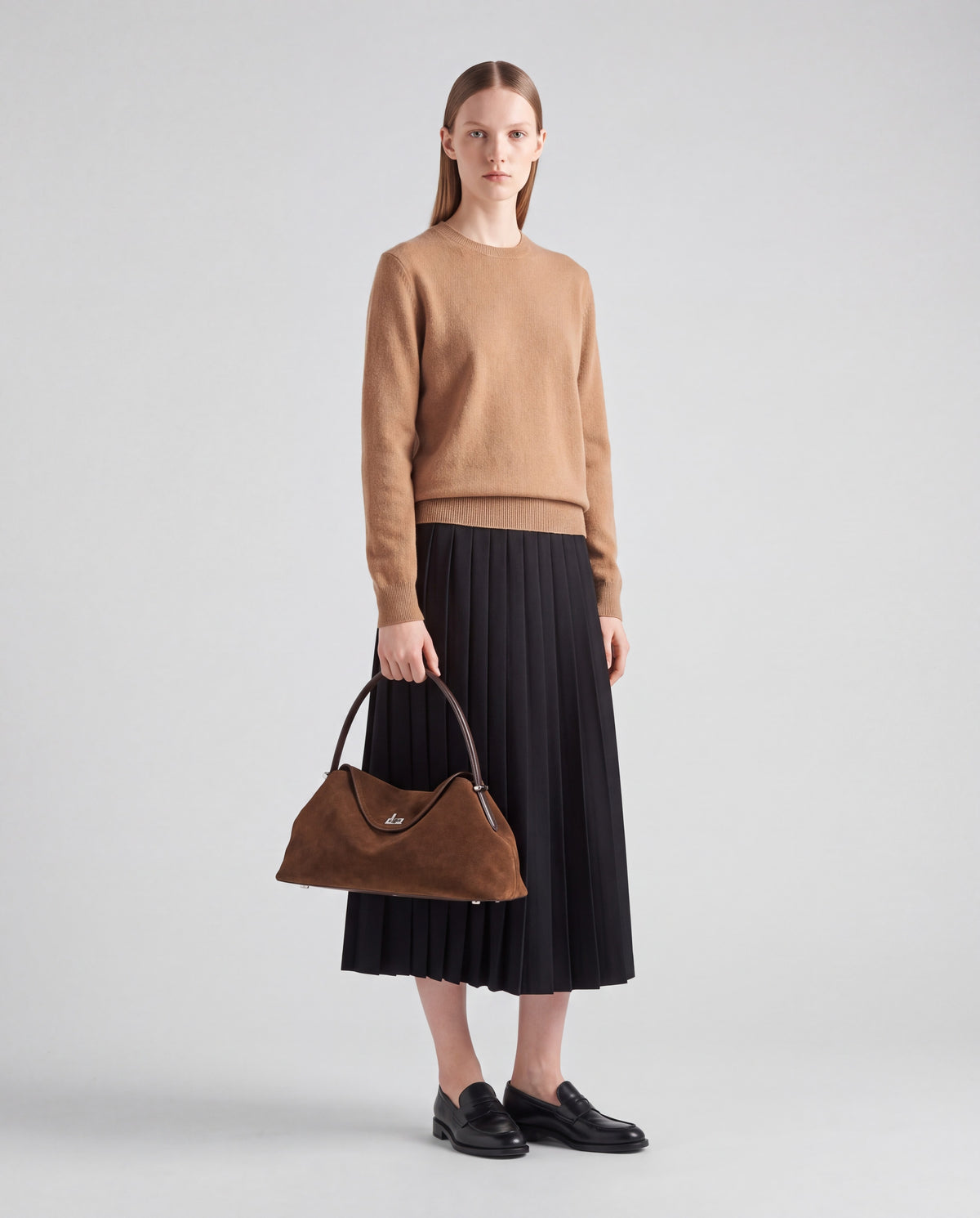 Bowler bag in Brown – worn by model, full length