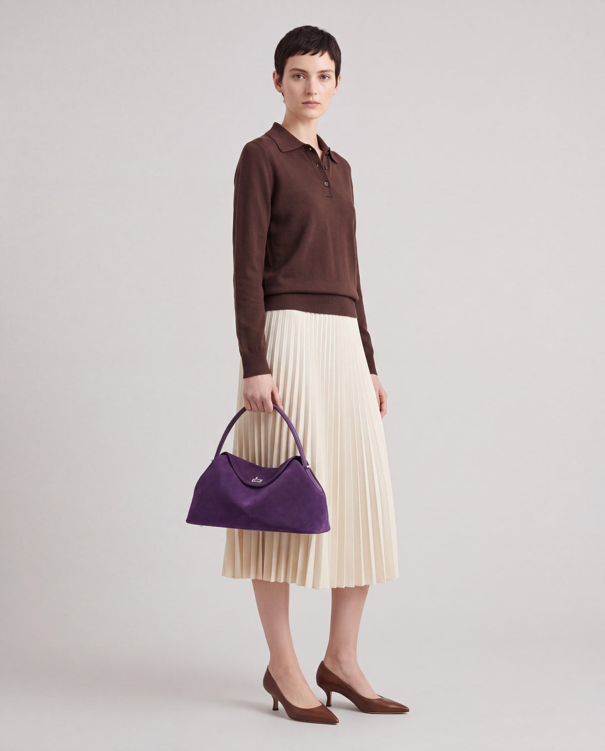 Bowler bag in Purple – worn by model, full length