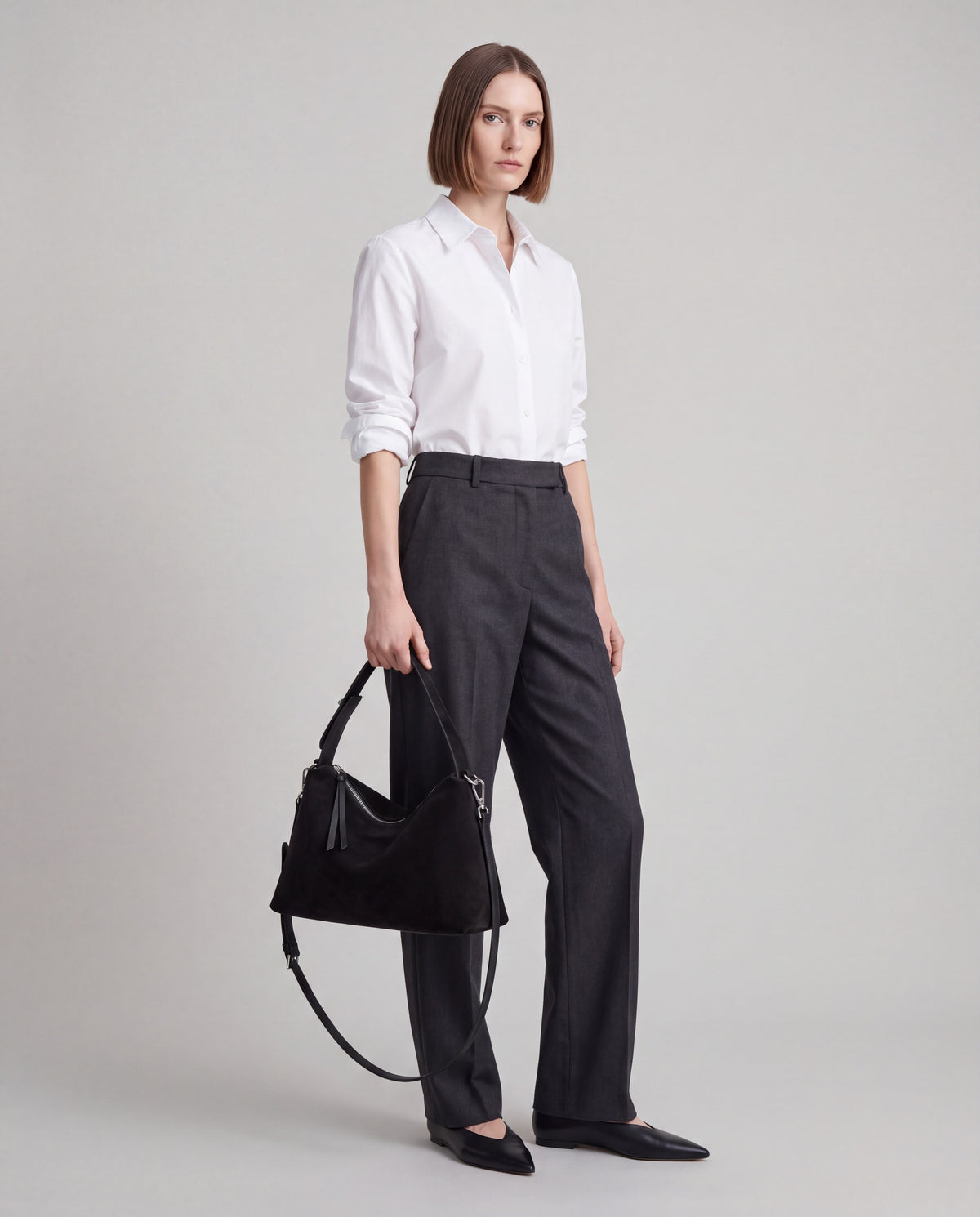 Calma bag in Onyx – worn by model, full length