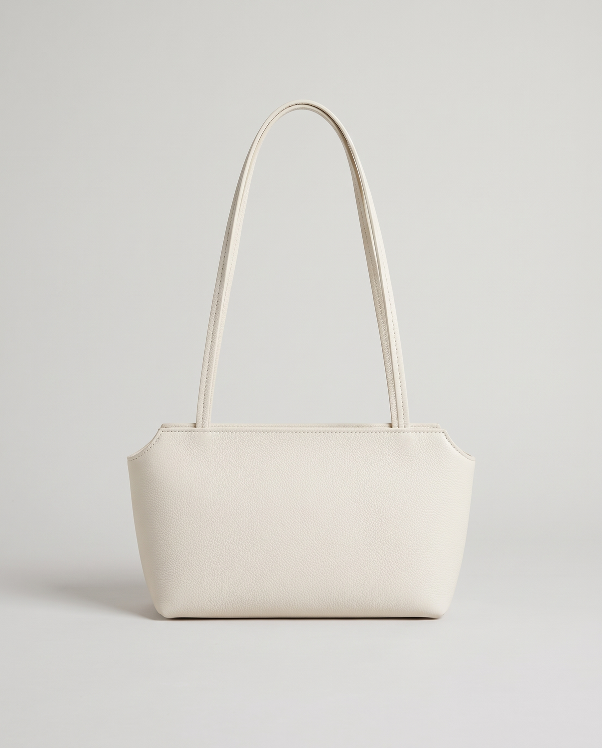 Capri leather shoulder bag in white, front view