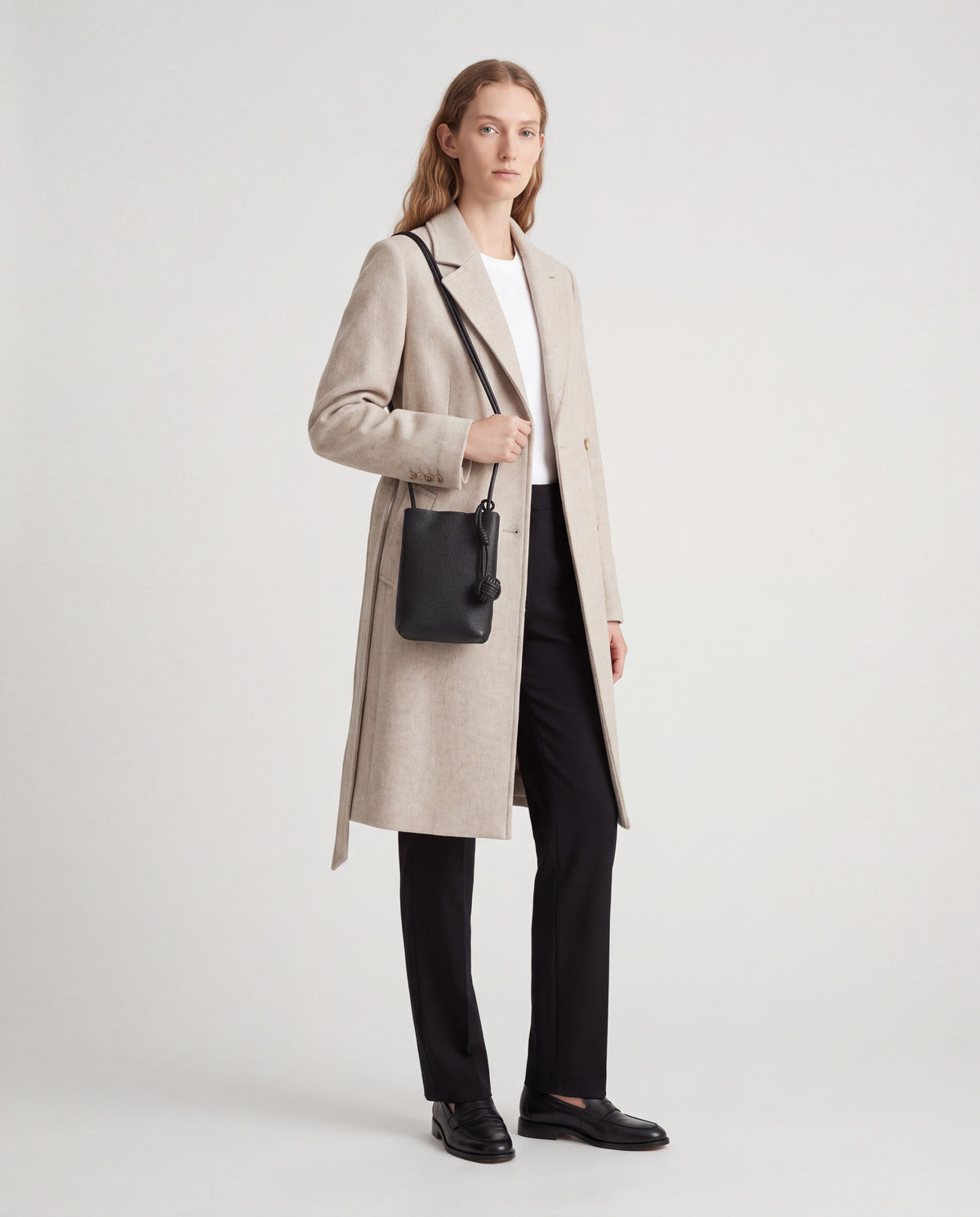 Cara bag in Black – worn by model, full length