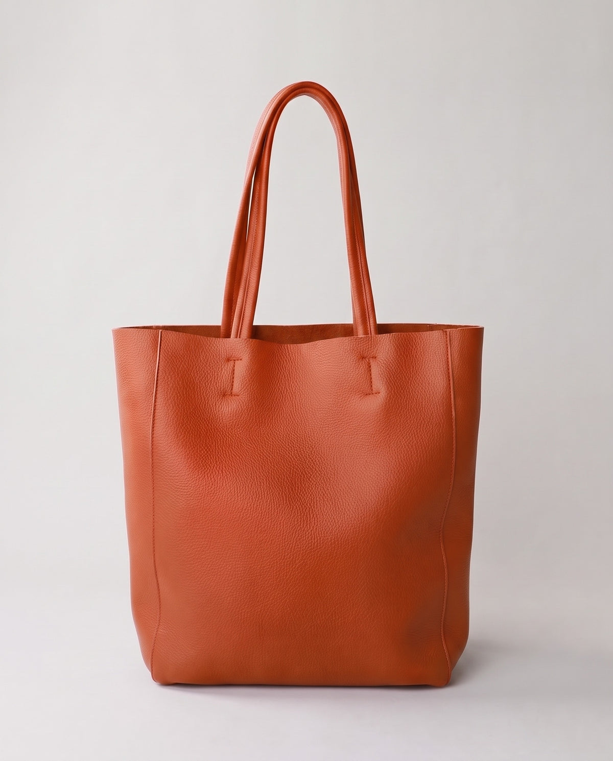 Costa leather tote in caramel, front view