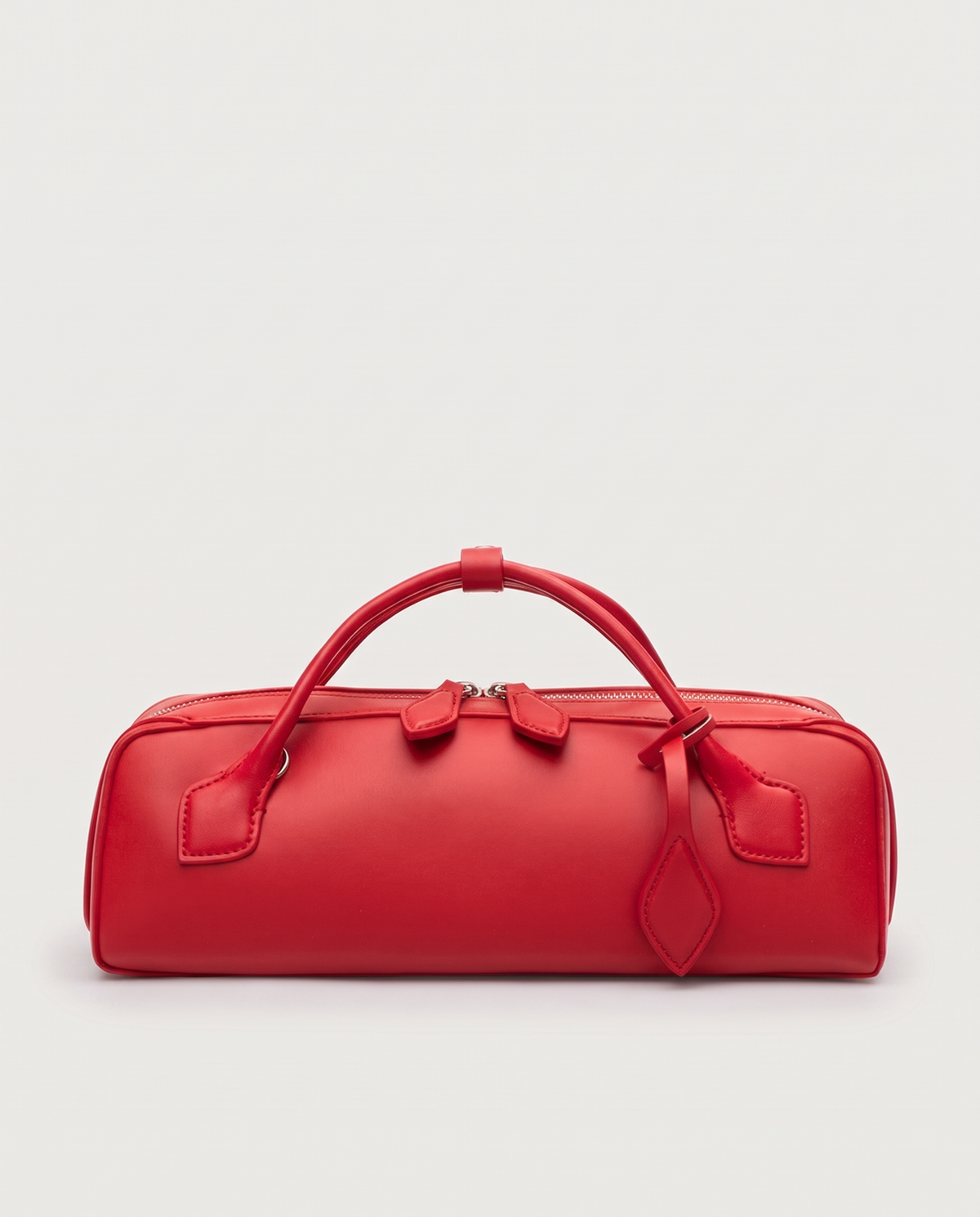 Curve leather barrel bag in Red – front view