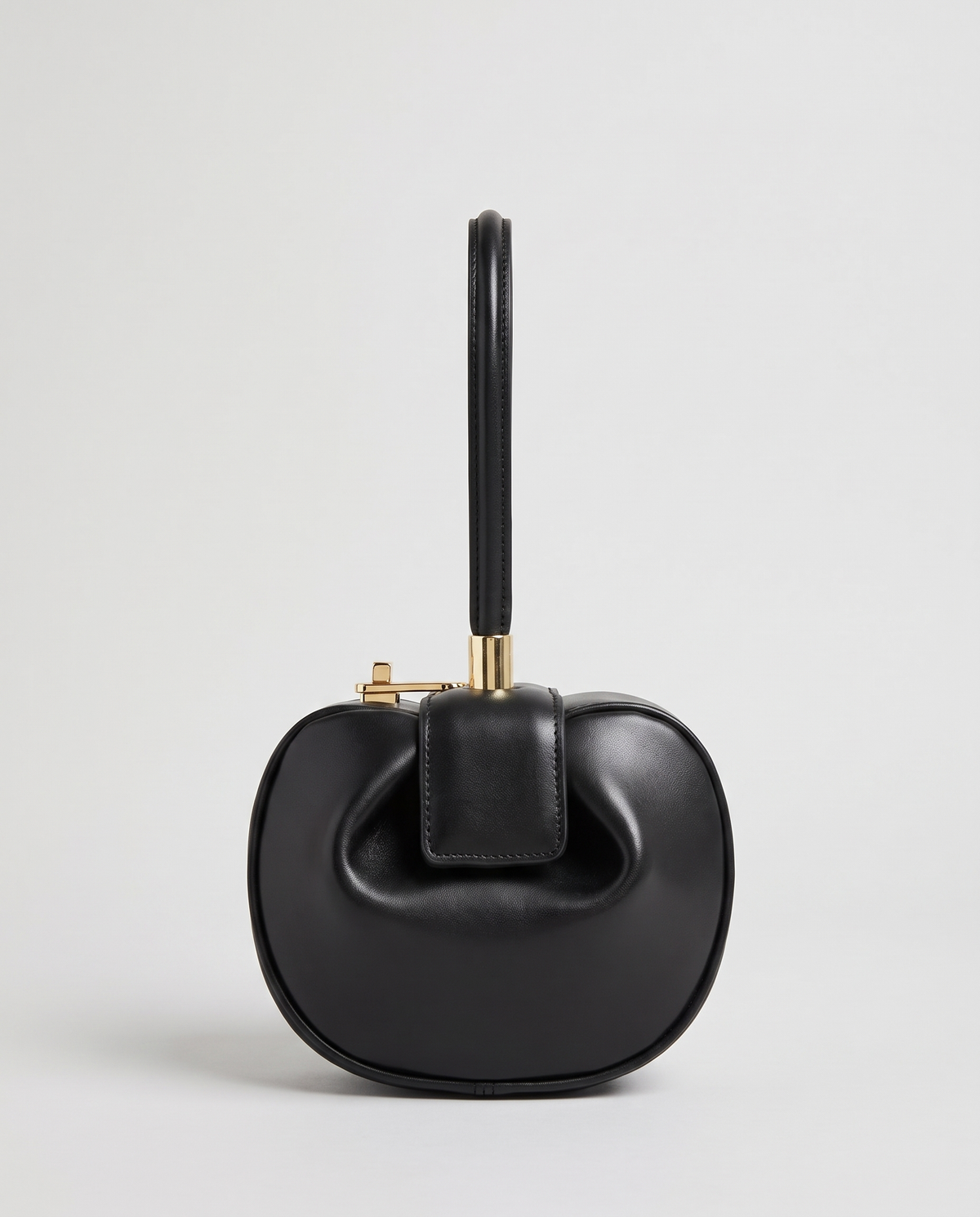 Dumpling Mini leather top-handle bag in Black – front view