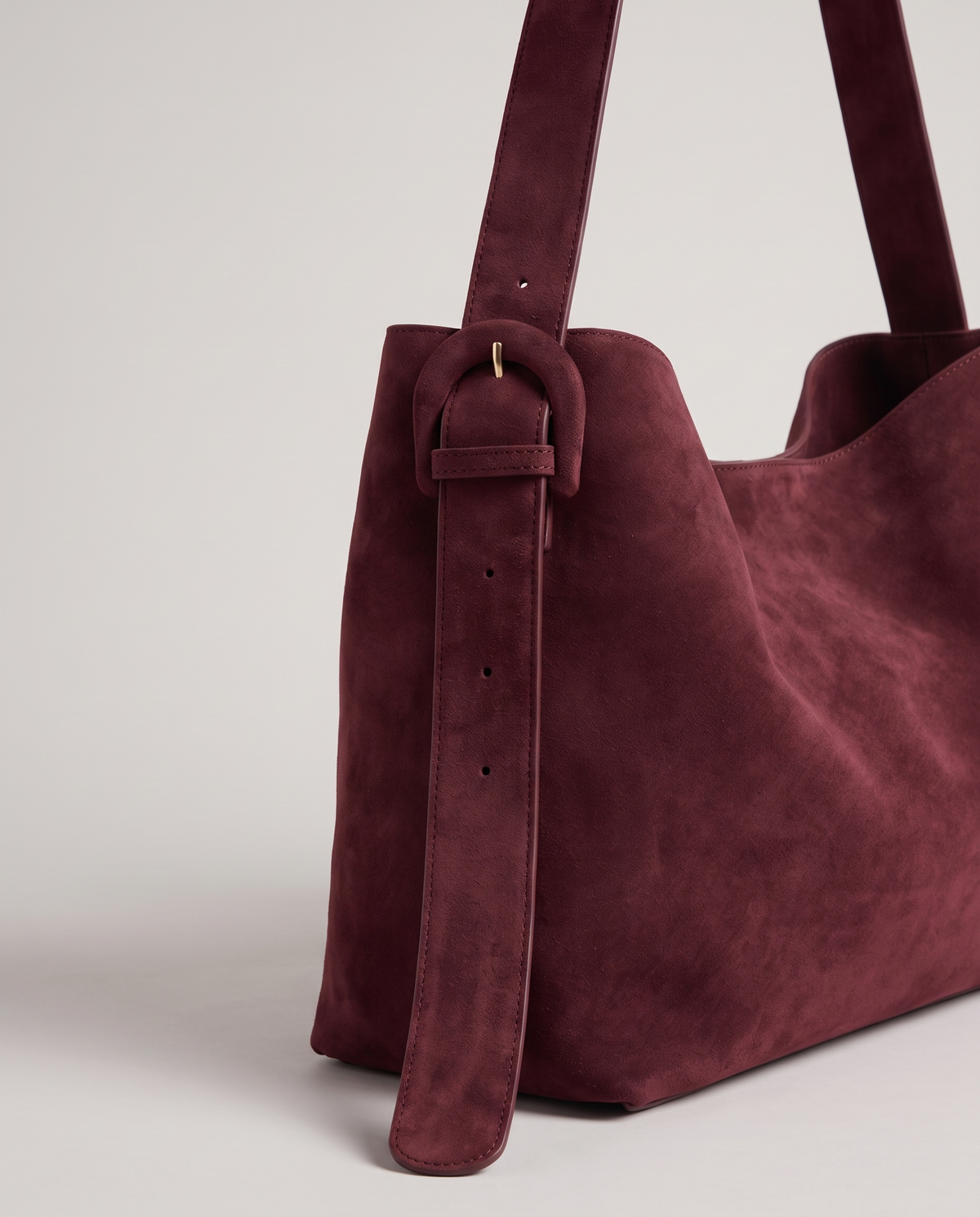 Elba suede tote in burgundy, hardware and leather detail