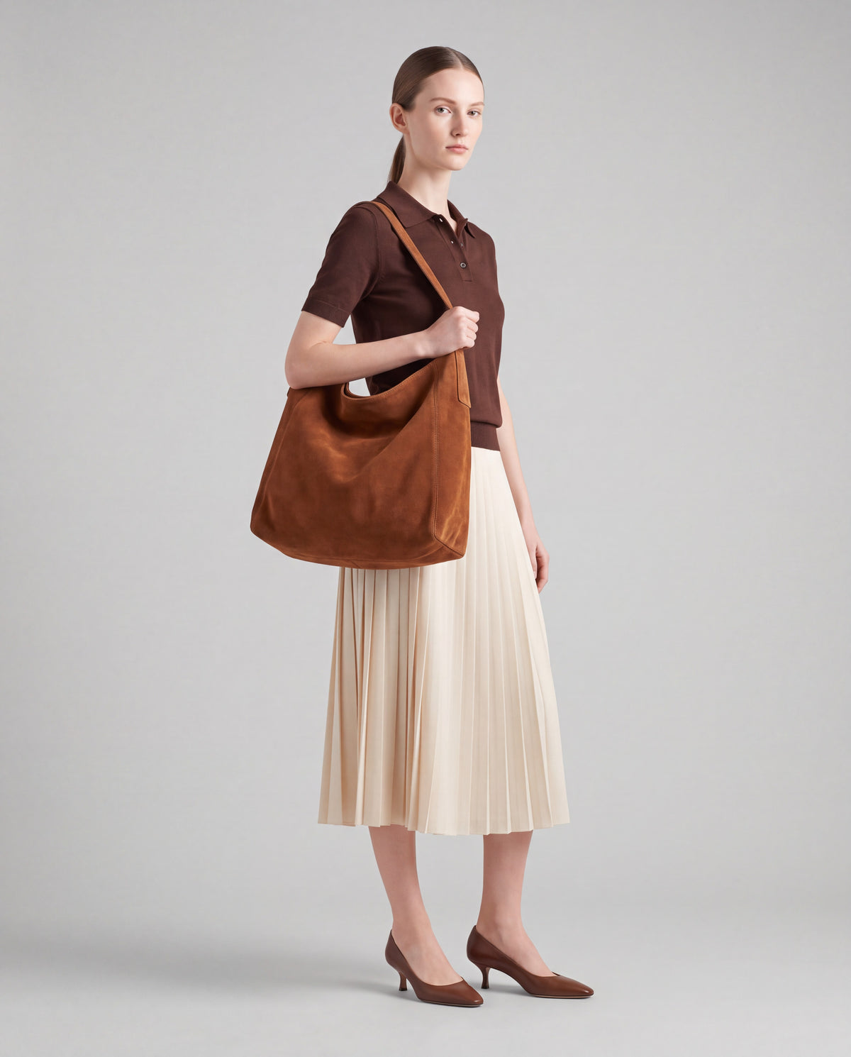 Fiato bag in Cognac – worn by model, full length