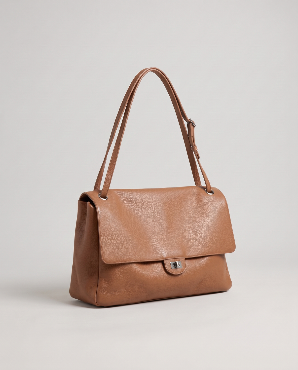 Fiume leather shoulder bag in caramel, three-quarter view
