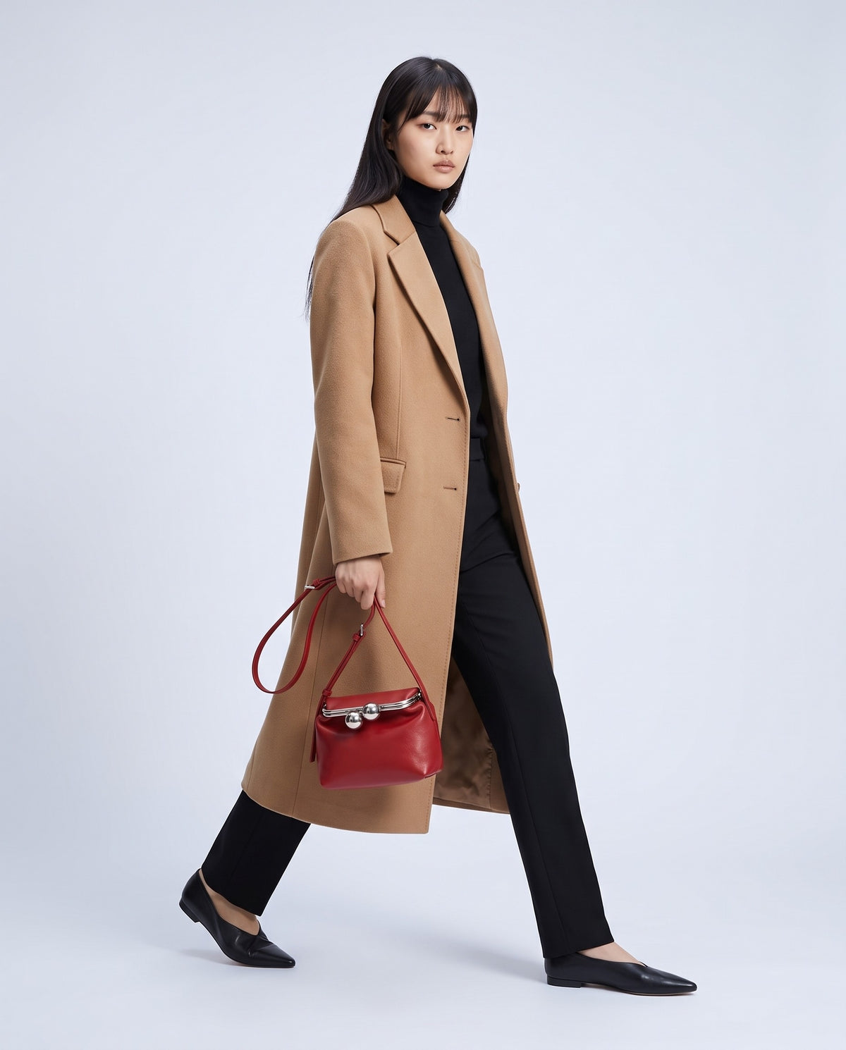 Model wearing the Garda frame bag in Red – full-length view
