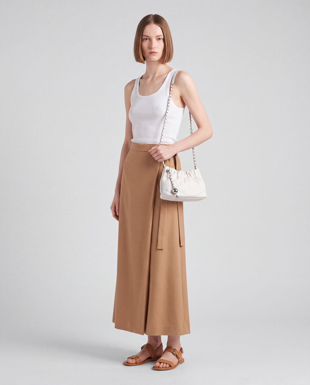 Giro bag in White – worn by model, full length