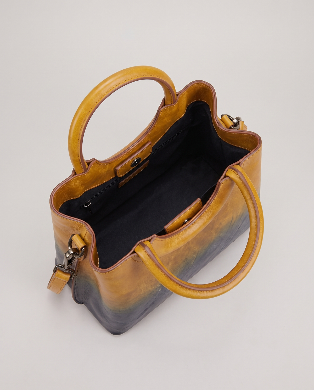 Ombra hand-painted ombré leather bag in Yellow – view from above into the lined interior