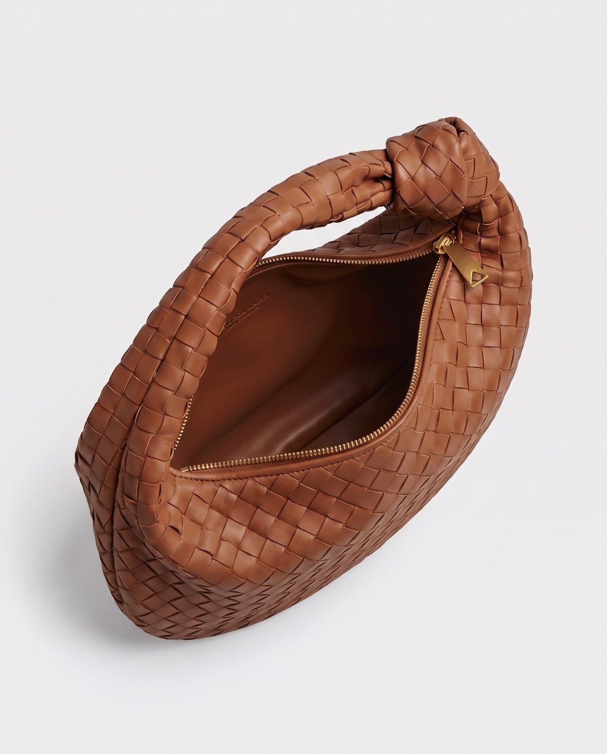 Knot Maxi woven leather shoulder bag in Brown – inside view with the zip open