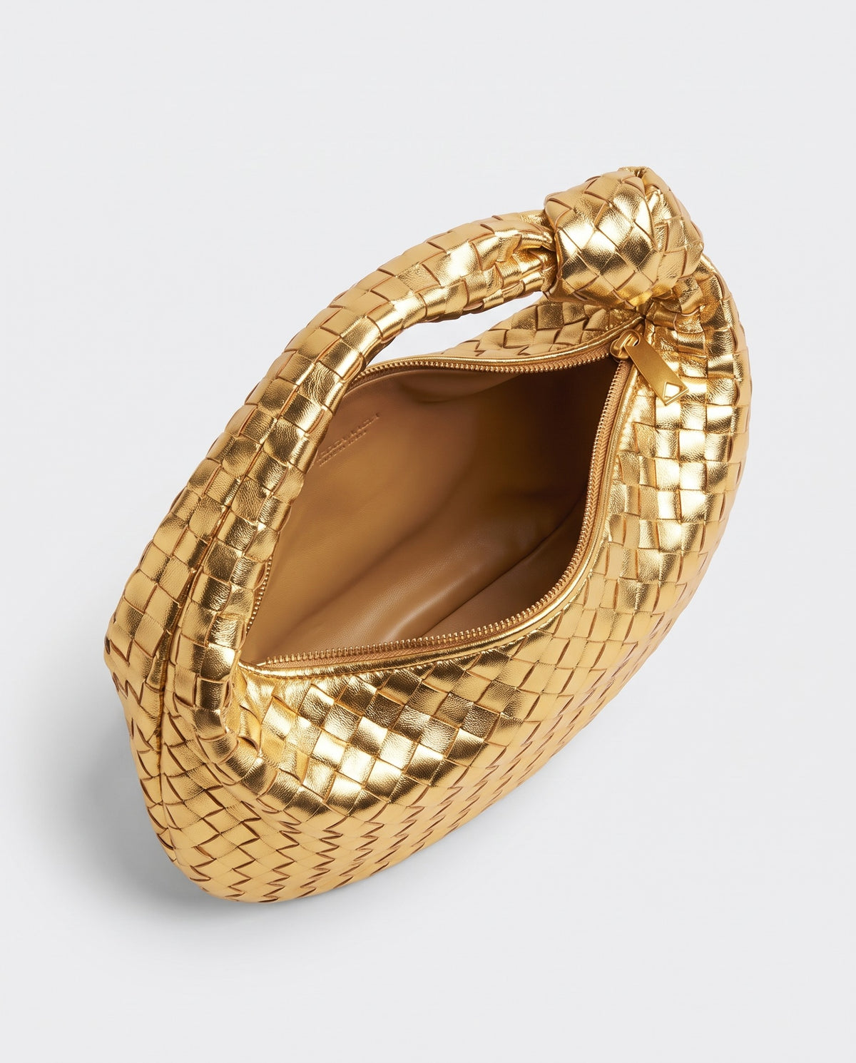 Knot Maxi woven leather shoulder bag in Gold – inside view with the zip open