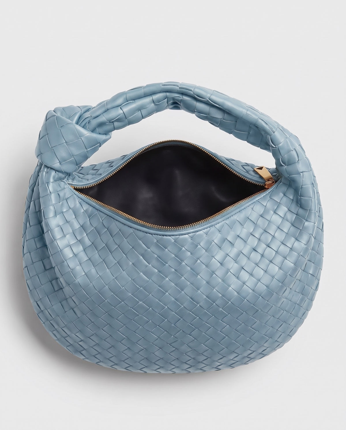 Knot Midi woven leather bag in Blue – inside view with the zip open