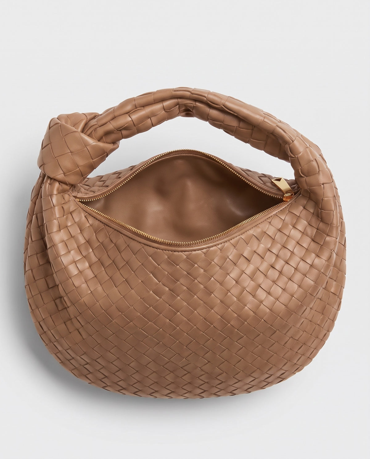 Knot Midi woven leather bag in Caramel – inside view with the zip open