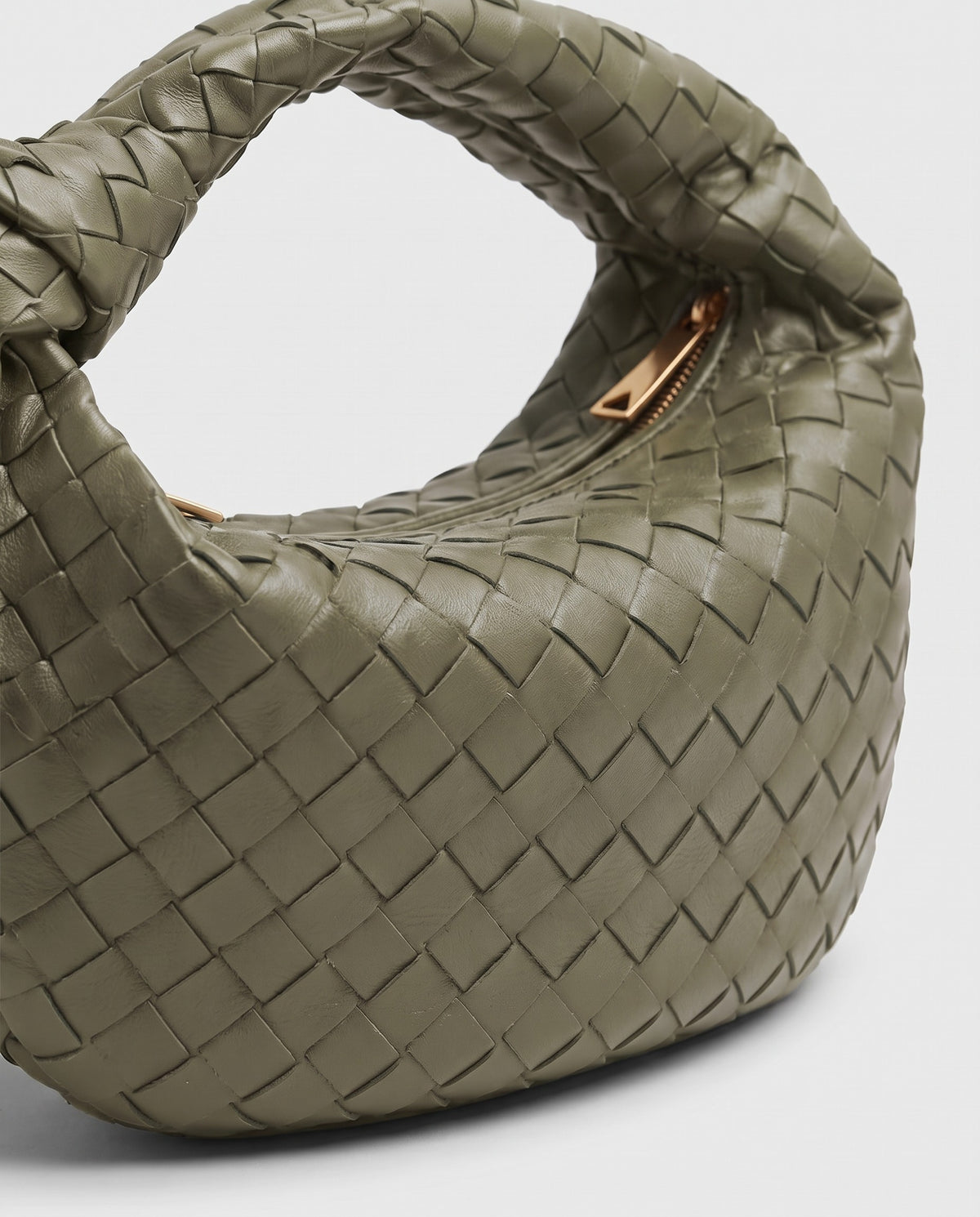Knot Midi woven leather bag in Sage – close-up of the woven leather