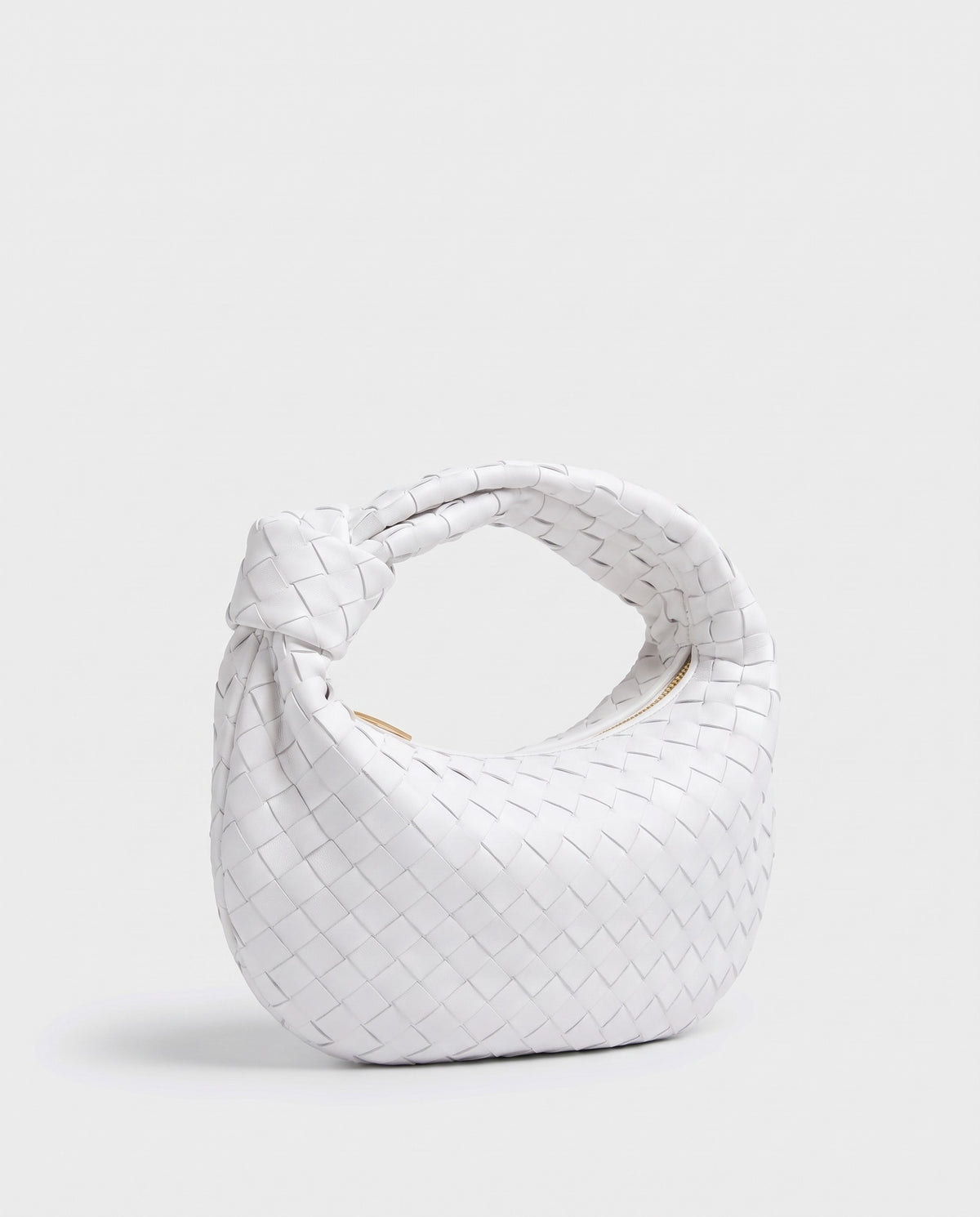 Knot Midi woven leather bag in White – three-quarter view
