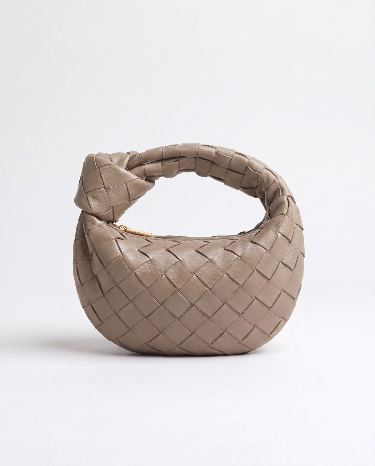 Knot Mini woven leather bag in Camel – front view