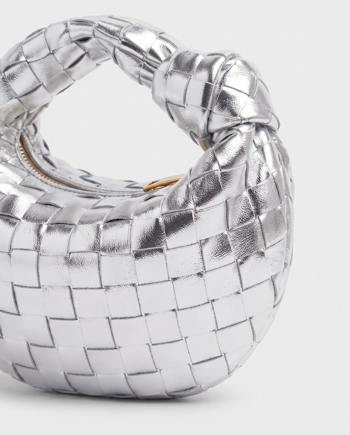 Knot Mini woven leather bag in Silver – close-up of the woven leather