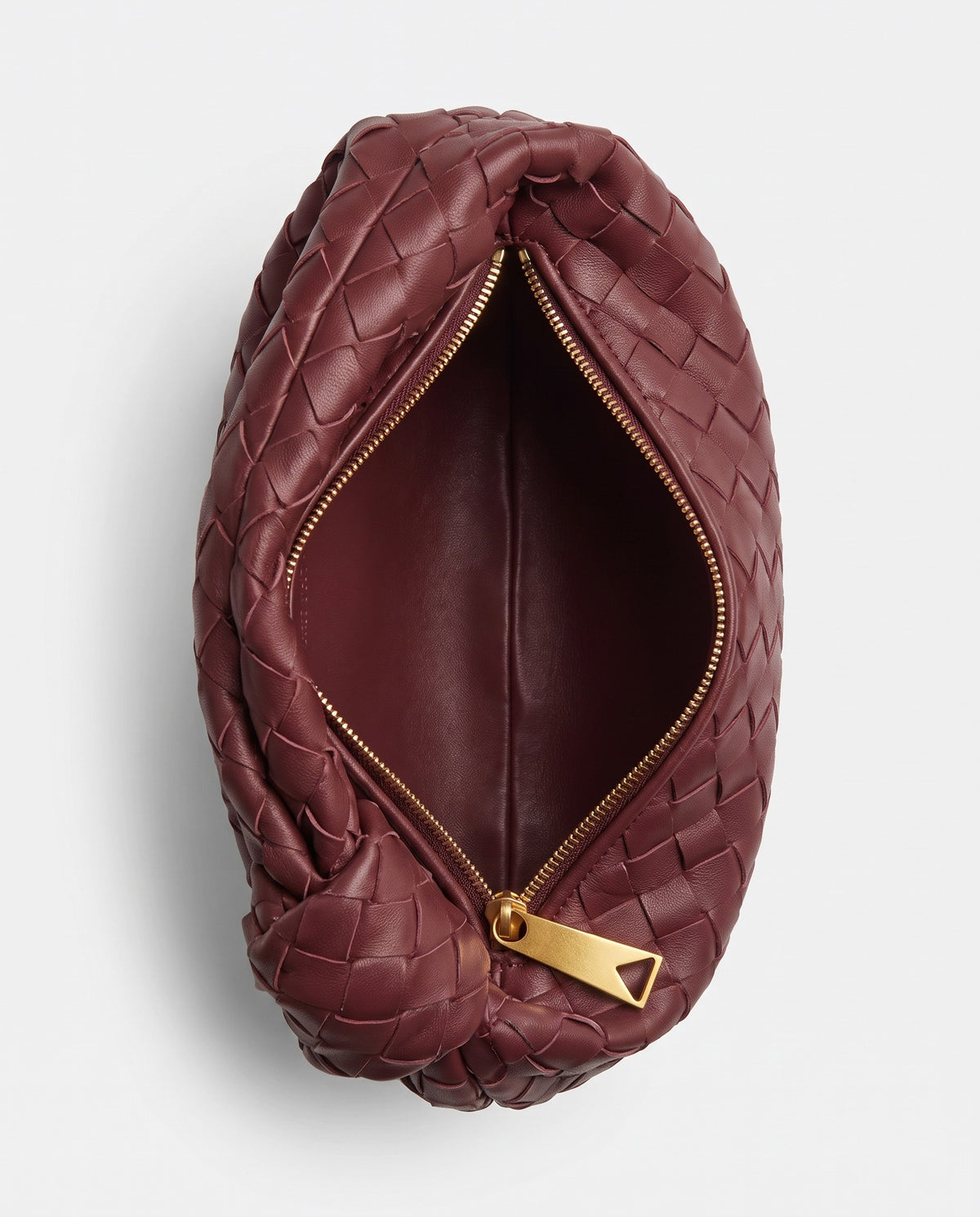 Knot Small woven leather bag in Bordeaux – inside view showing the lining and zip
