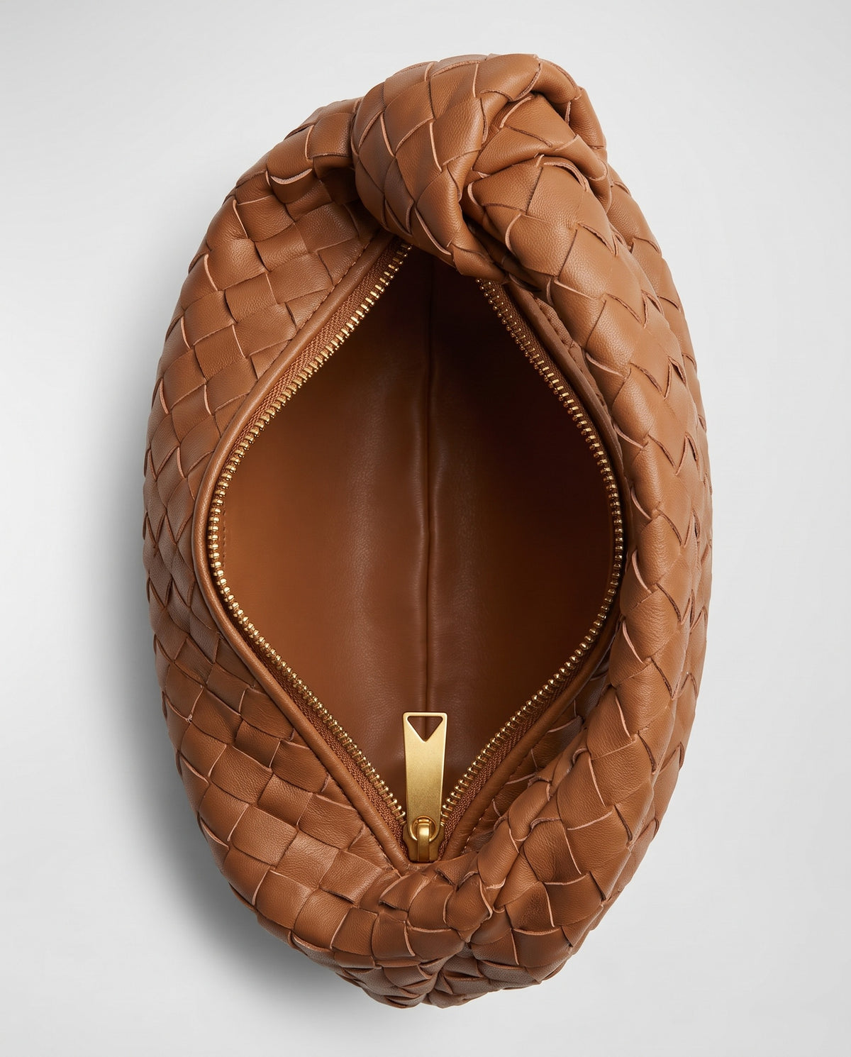 Knot Small woven leather bag in Brown – inside view showing the lining and zip