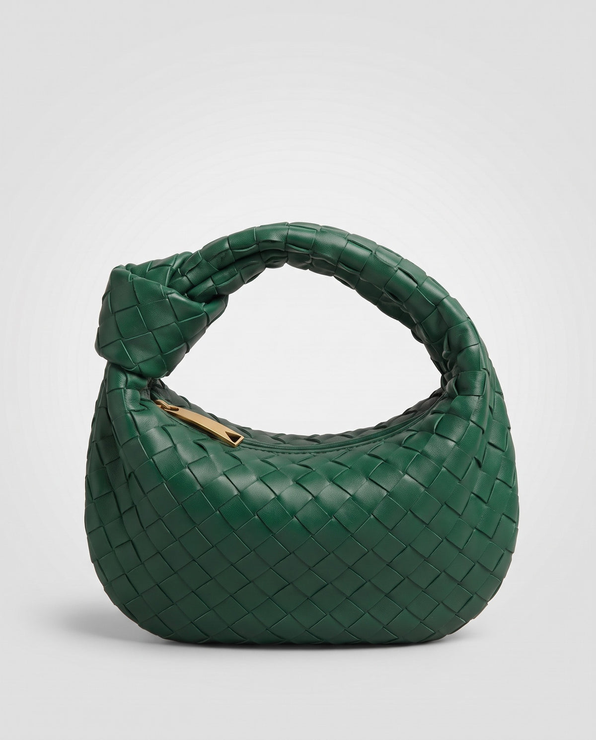 Knot Small woven leather bag in Green – three-quarter view